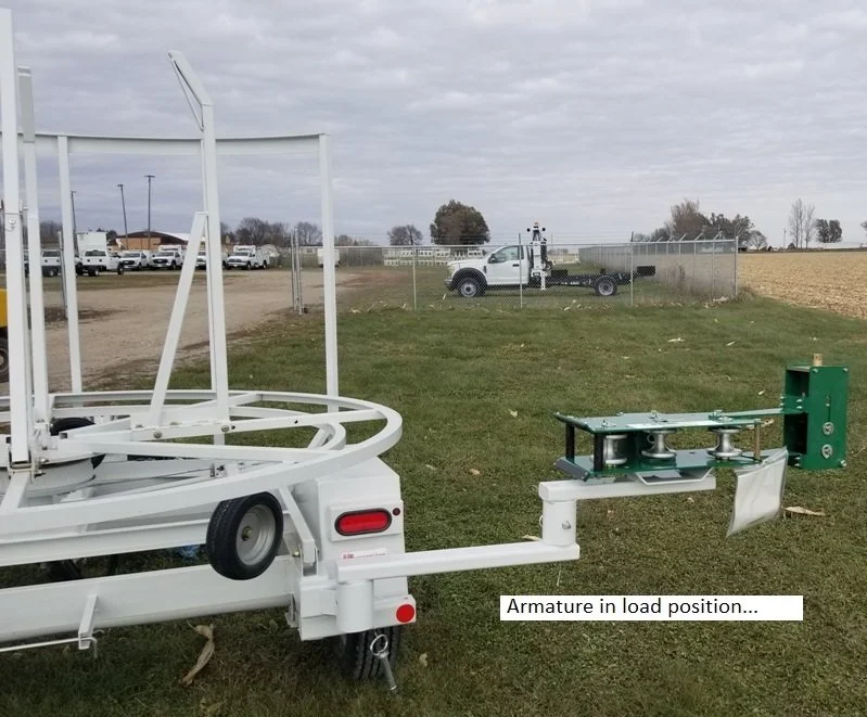 Single Reel trailer at a different angle with a McElroy LineTamer 2" installed sold by Maverick, Inc. located in Story City, Iowa