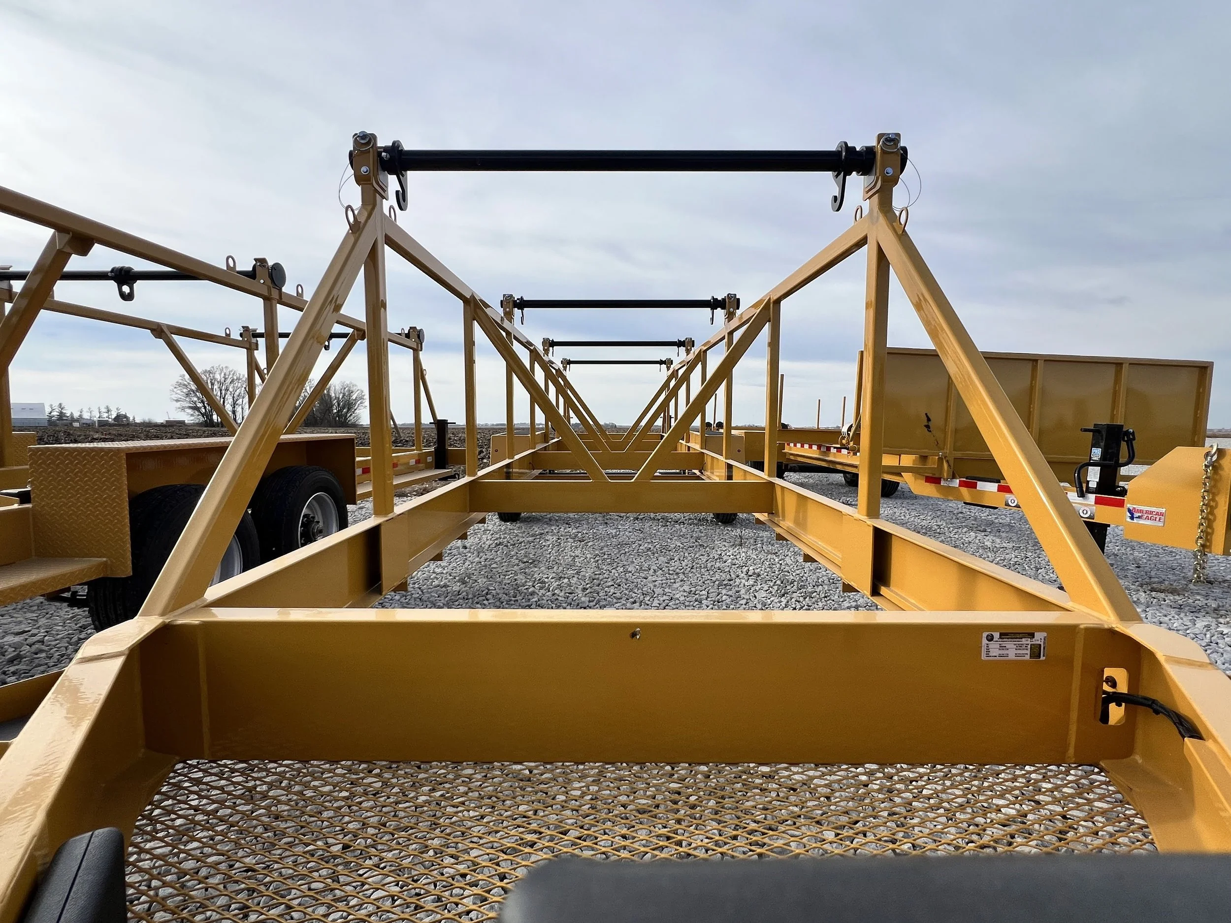 Rear view of a Drop On 4 Reel or Four Reel Cable, Duct or Innerduct Trailer. Used for Transport and installation of utility products.