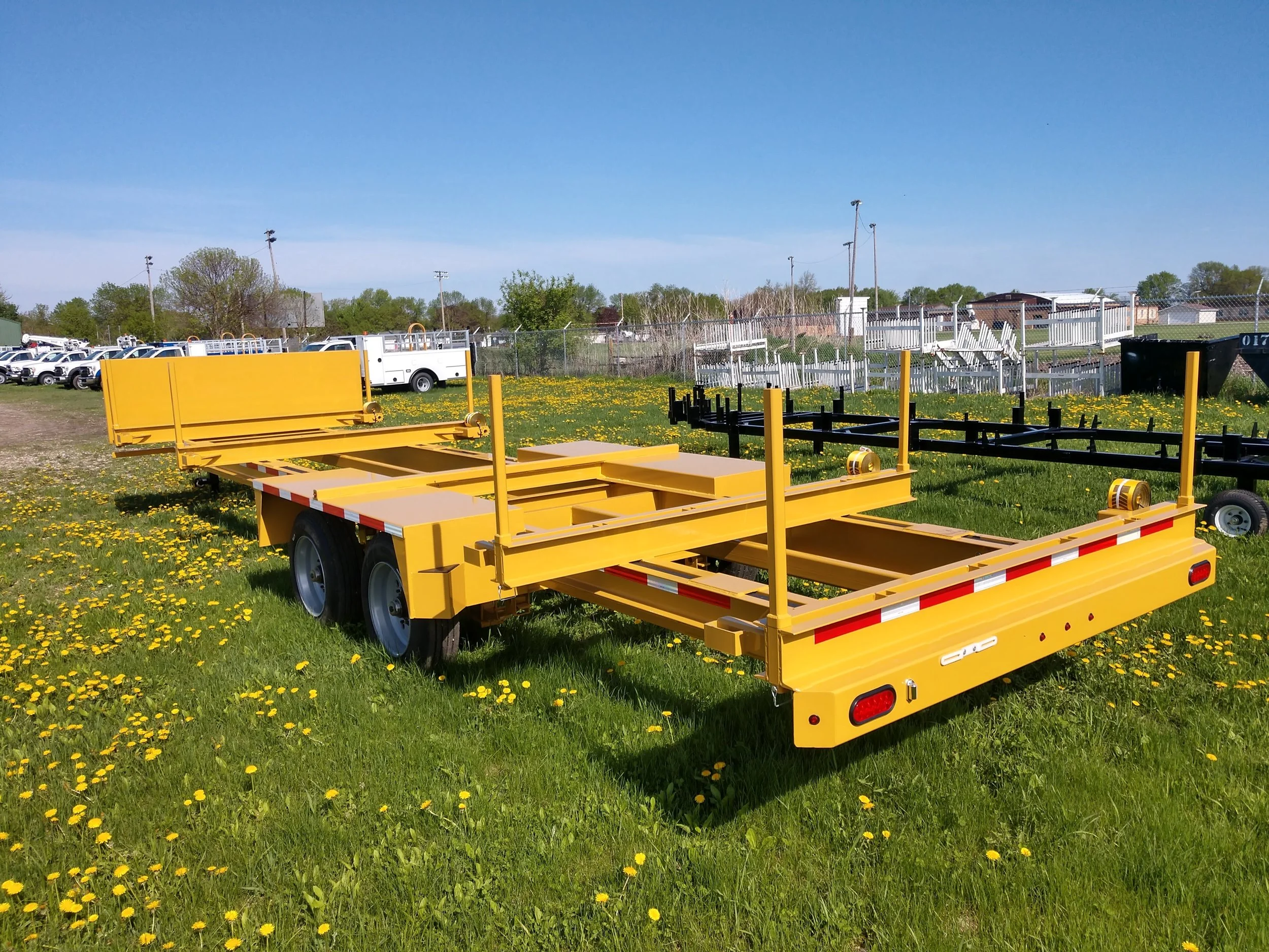Row of Telescoping Stick Pipe Trailers sold by Maverick, Inc. located in Story City, Iowa