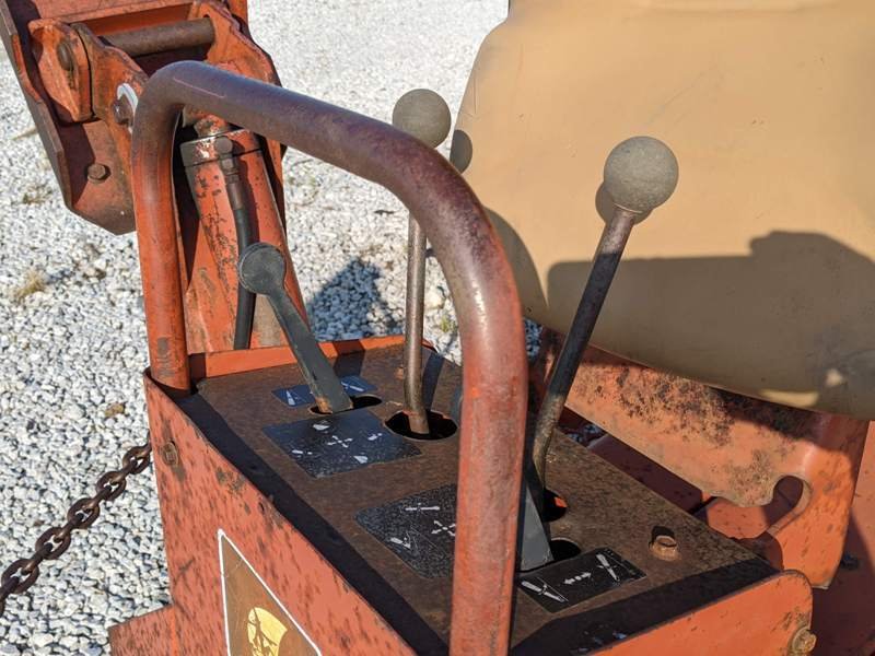 Up close image of gear knobs on a Used Ditch Witch 4010 Backhoe Trencher sold by Maverick, Inc. located in Story City, Iowa