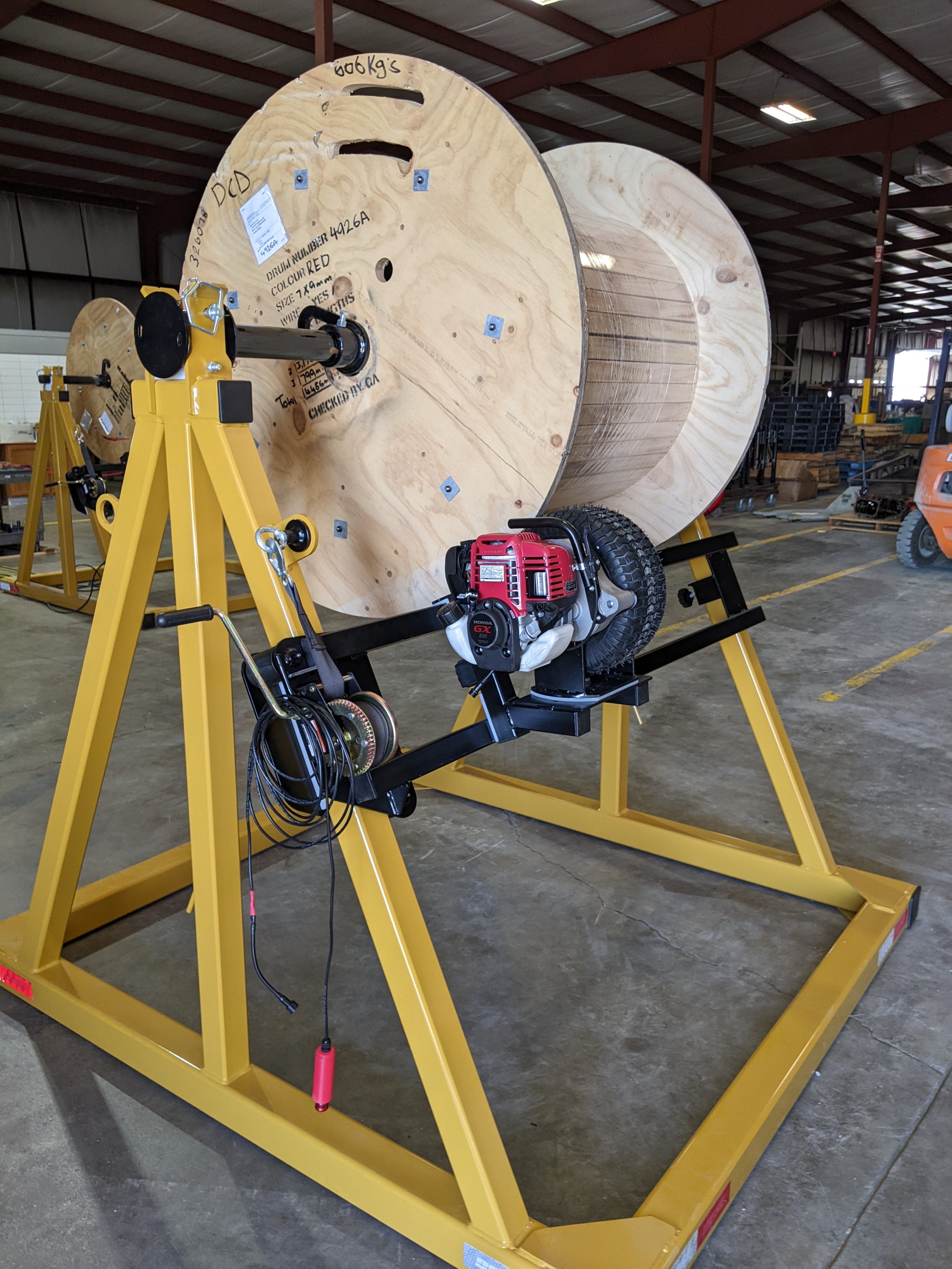 Distant view of reel stand gas powered rewind