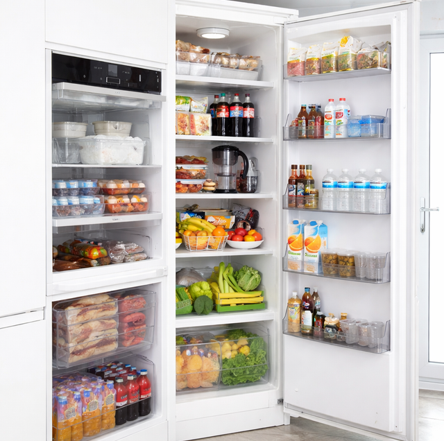crisp lettuce frozen solid inside open refrigerator drawer
