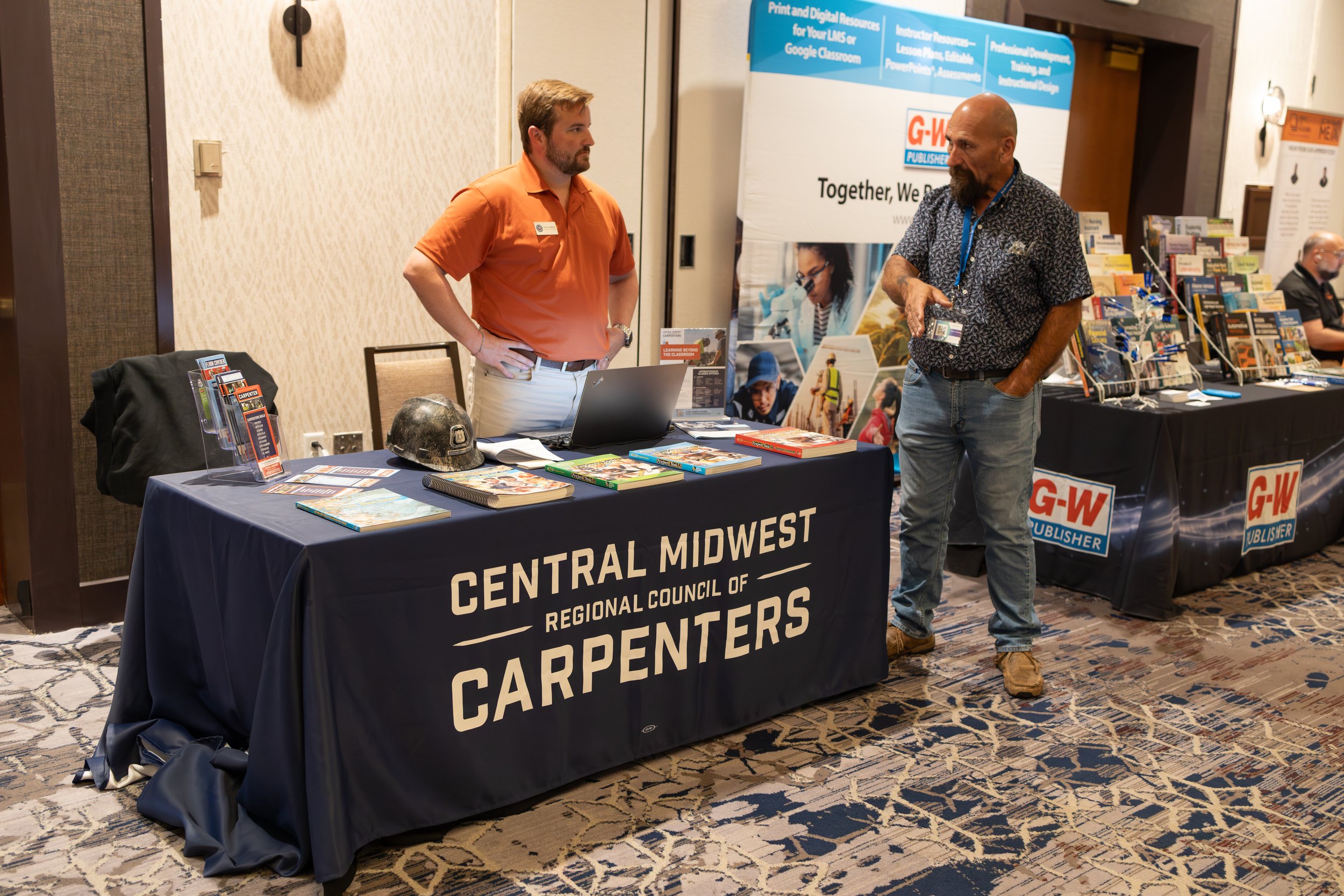 inacte attendee and exhibitor engaging in conversation at the 2025 inacte conference