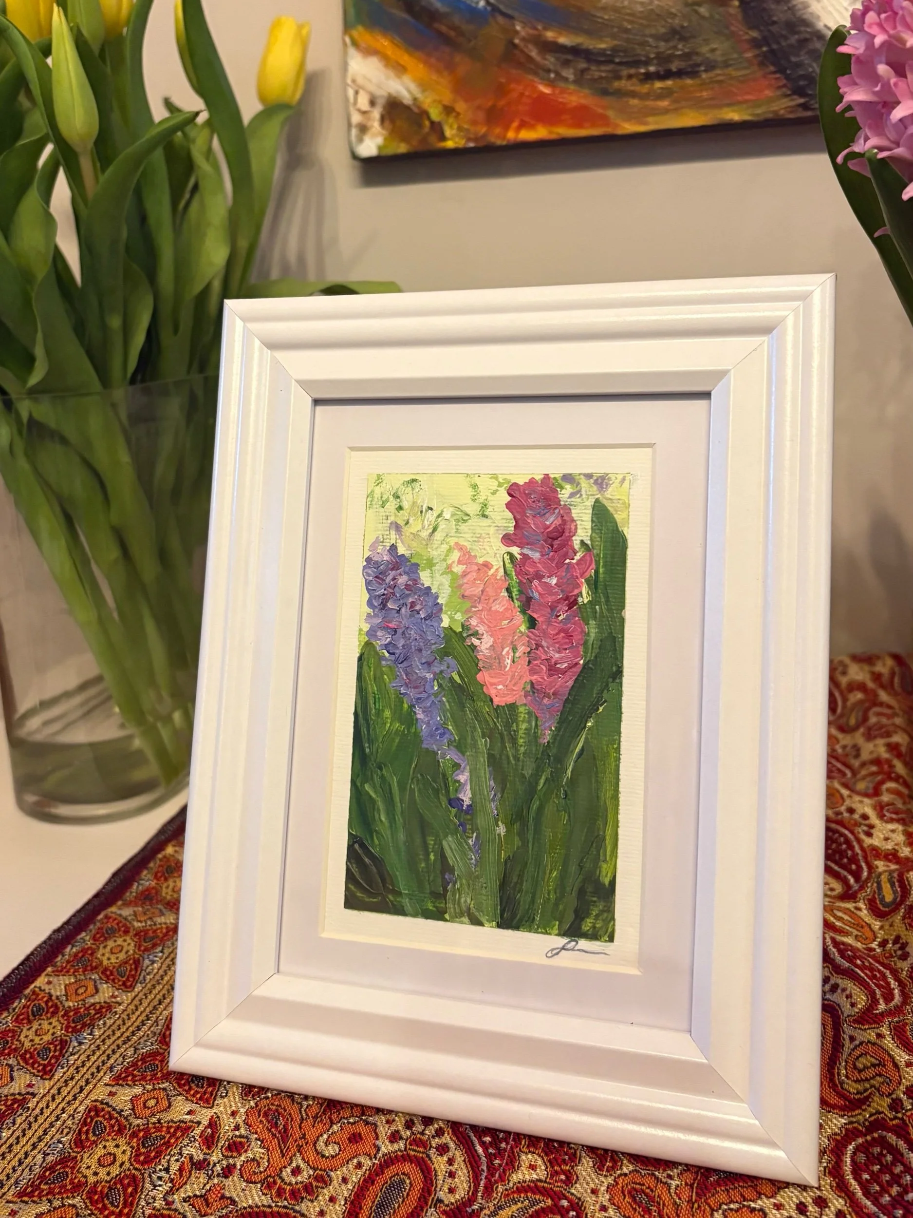 original abstract acrylic painting of hyacinths on paper by artist Sahar Boussard, shown in situ