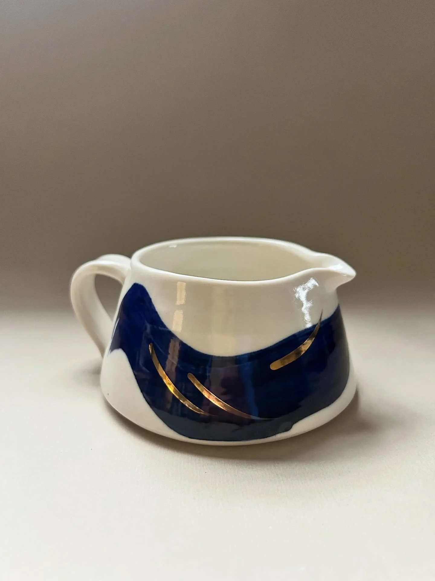 Medium porcelain cobalt and gold lustre jug &pound;38
#jug #porcelain #handthrown #goldlustre