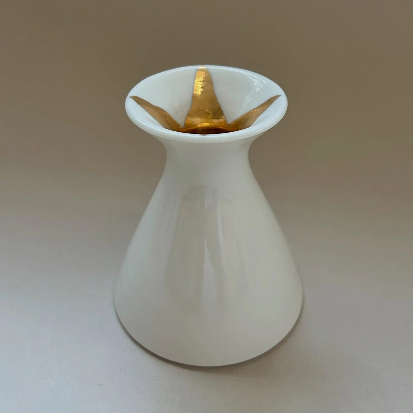 Festive bud vase &pound;28 
White porcelain with gold lustre details 🌟