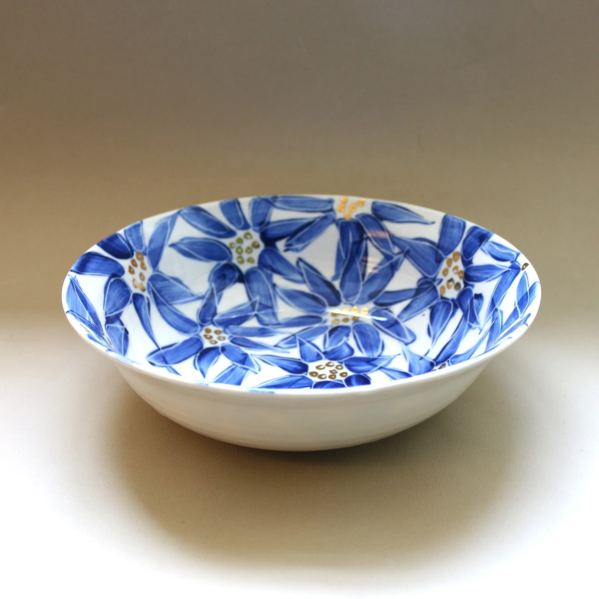 Blue and White Daisy Porcelain Bowl with Gold Hearts. #SuzanneKing #HandThrownPottery #blueandwhitedaisy