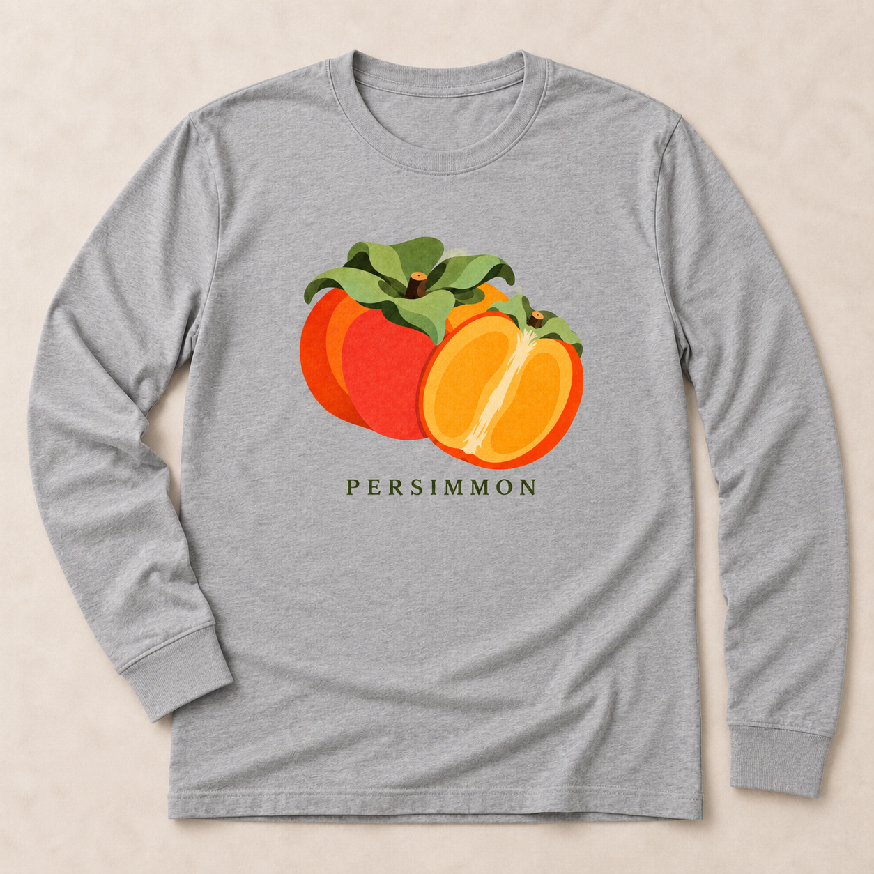 Athletic Heather Persimmon long-sleeve T-shirt with a whole orange persimmon, a cut half and green leaves on the front.