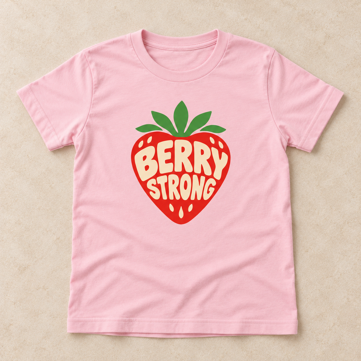 berry-strong-youth-tee-pink-front-flatlay.png