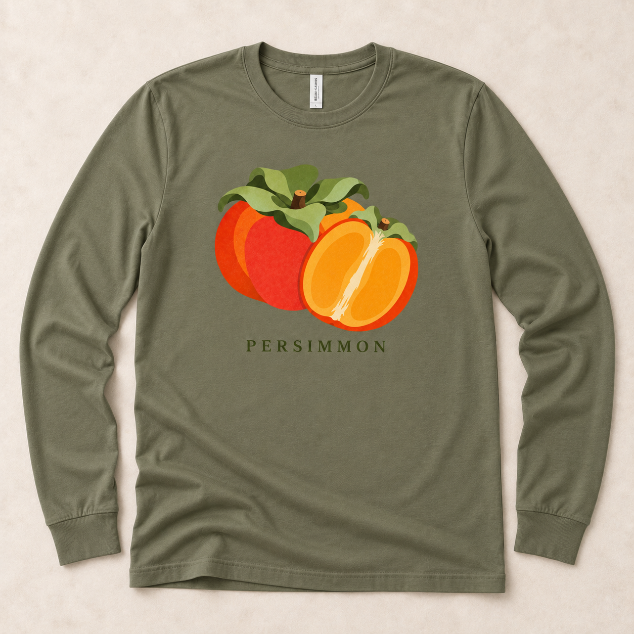 Military Green Persimmon long-sleeve T-shirt with a whole orange persimmon, a cut half and green leaves on the front.