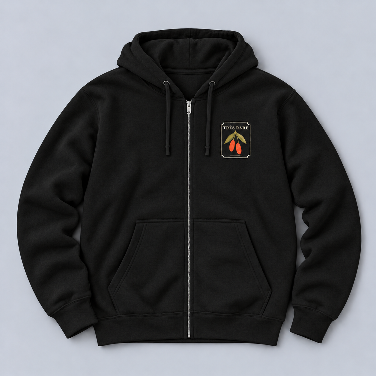 goumi-zip-black-front-relaxed-flat-lay.png
