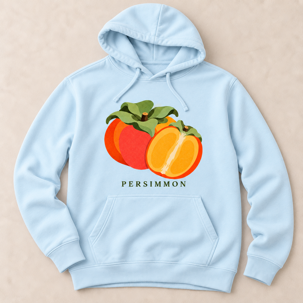 Sky Blue Persimmon pullover hoodie with a whole orange persimmon, a cut half and green leaves above the front pocket.