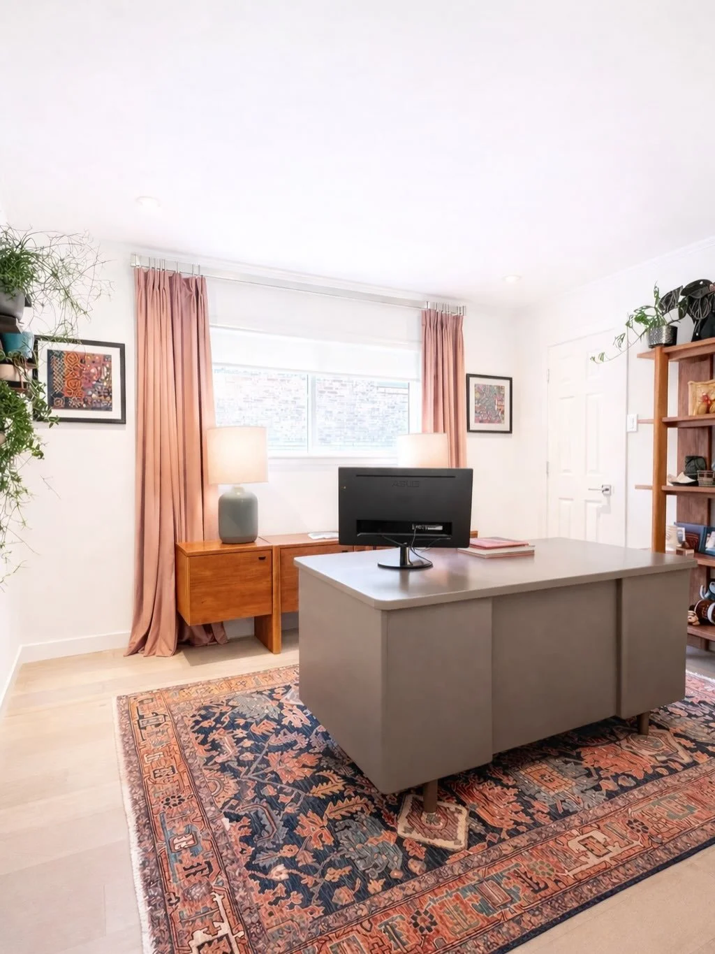 Created an office that is light, layered, and full of personality. 

We kept the warmth, added softness, and made space for all the things she loves &mdash; art, texture, and a spot that feels great to sit in. Wha a girl office should feel like!

Swi