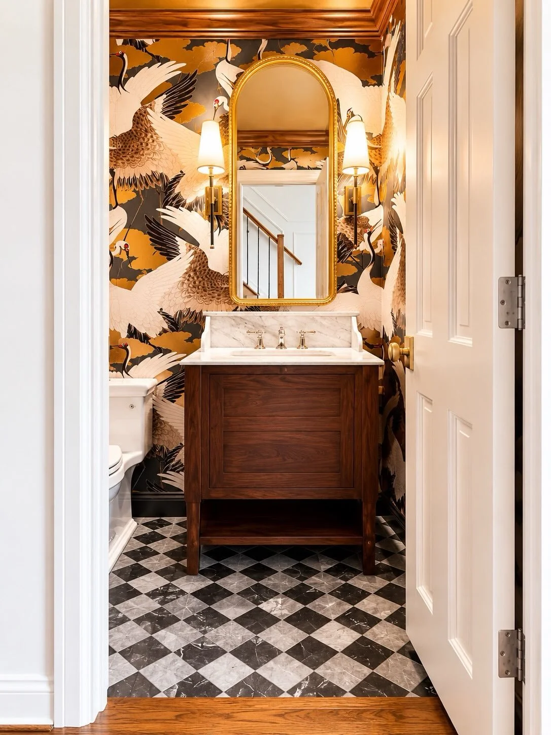 A little powder bath with a big personality. 

Bold wallpaper, rich wood tones, marble details, and a touch of gold came together to create a space that makes a statement the moment you open the door.

So fun working with @harmonyhome.design on this 