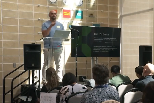 Wesley Espinoza presenting at Desert Dev 2026. His team created an innovative way to identify Food Deserts at the neighborhood tract level.
