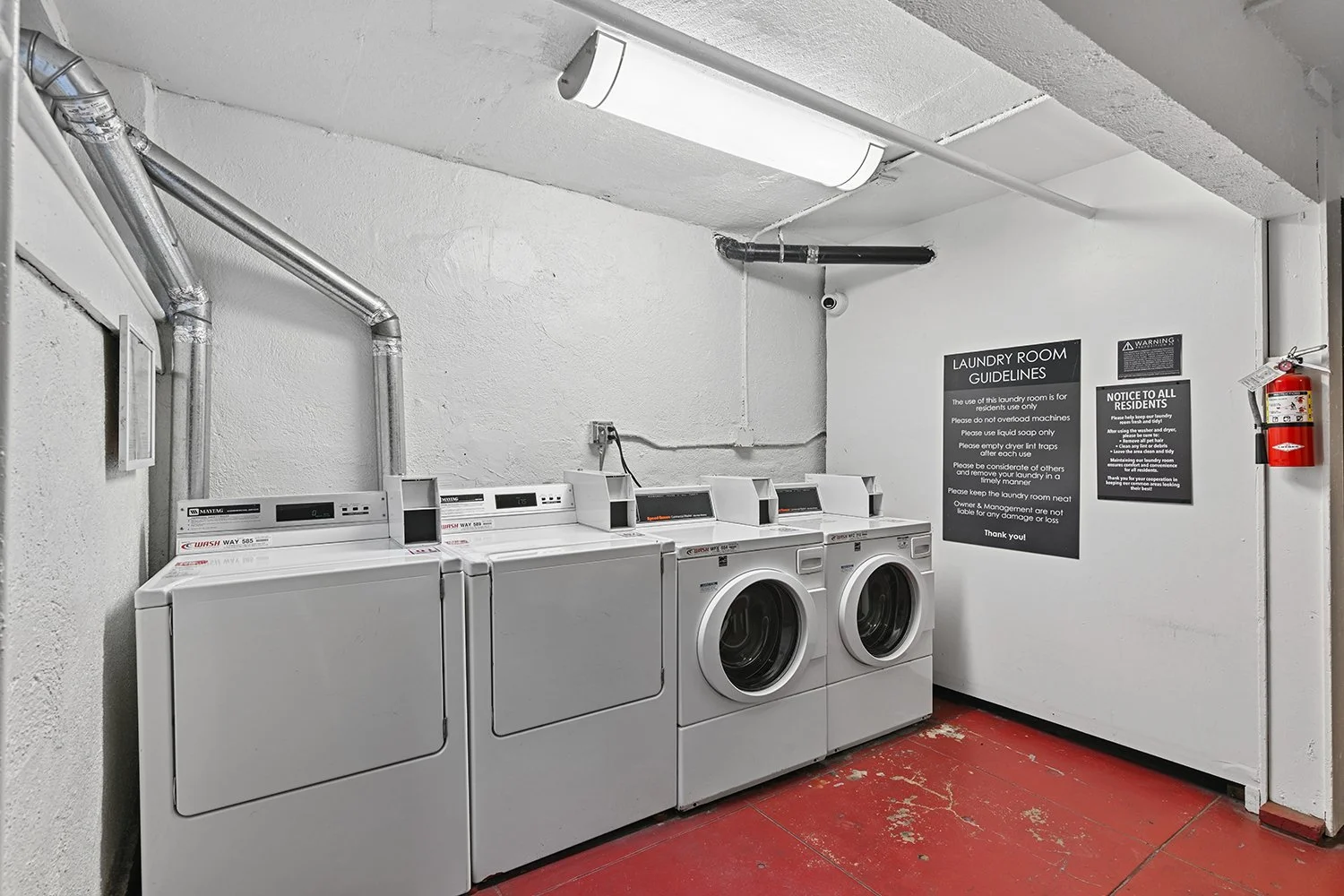 On-site laundry room at Cahuenga with multiple machines for convenience