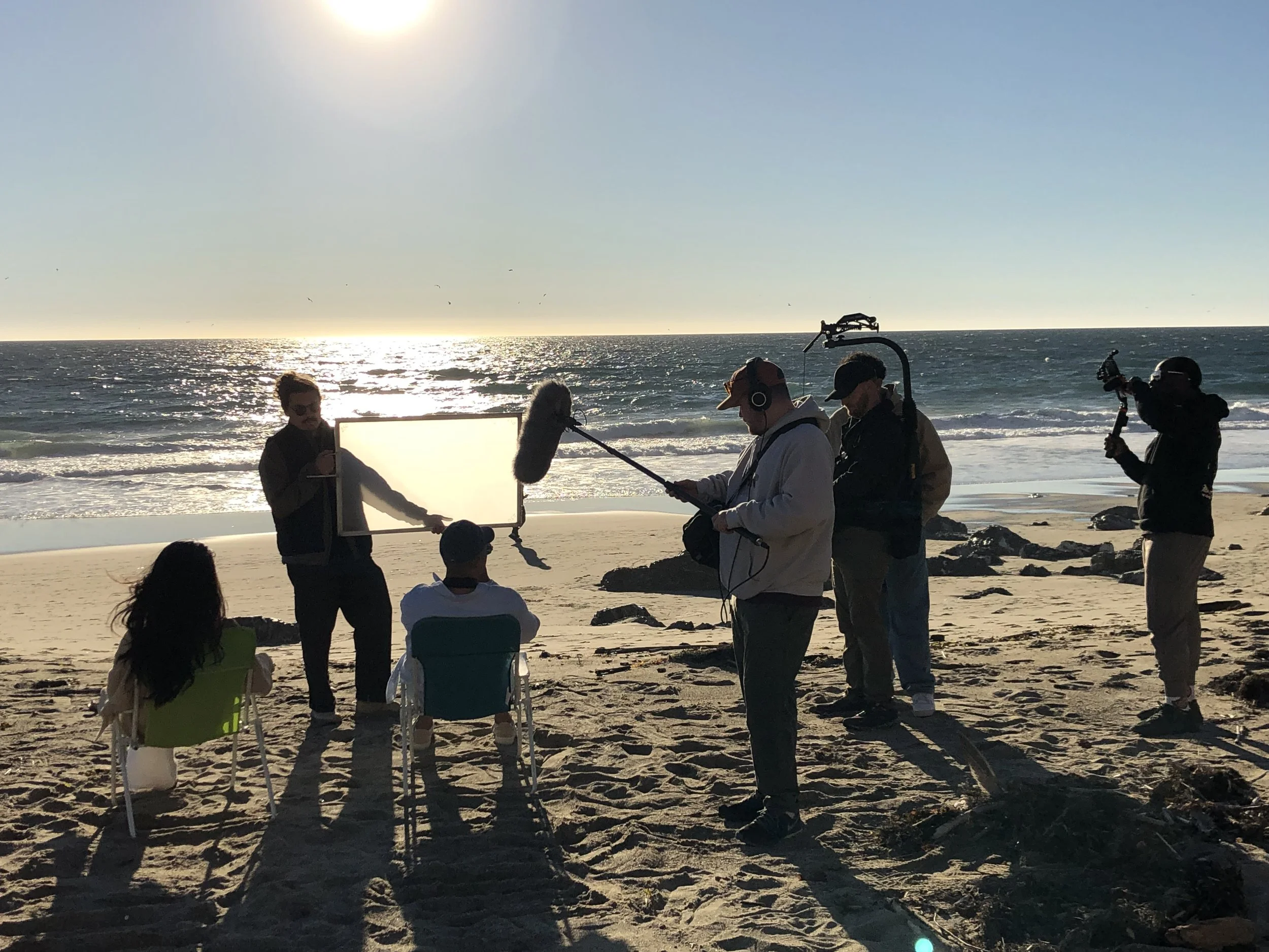 Babymoon filming on the beach
