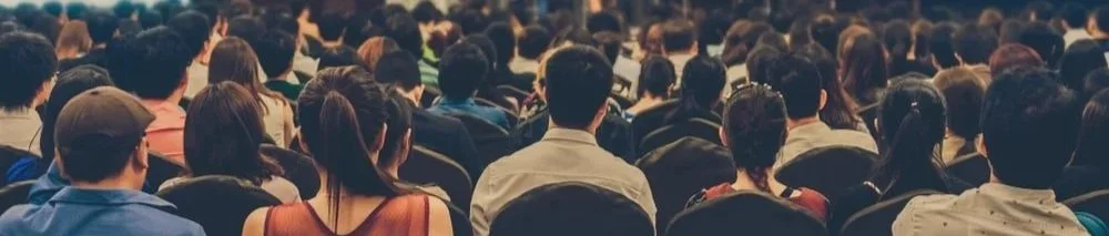 Nicholas Gentry, The Intellectual's Illusionist, speaking with a corporate audience about judgment and decision-making
