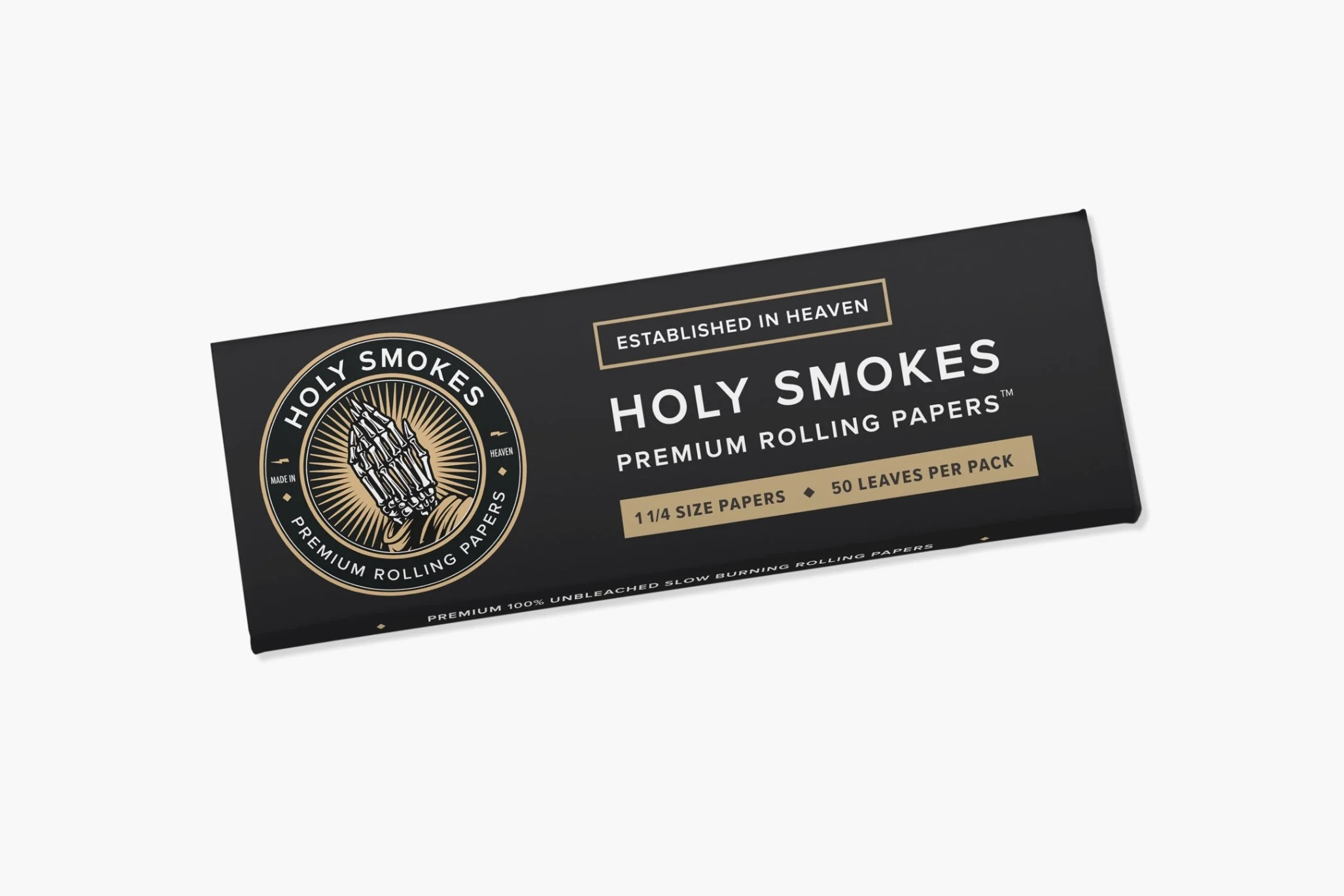 Black box of Holy Smokes premium rolling papers with gold and white text and logo