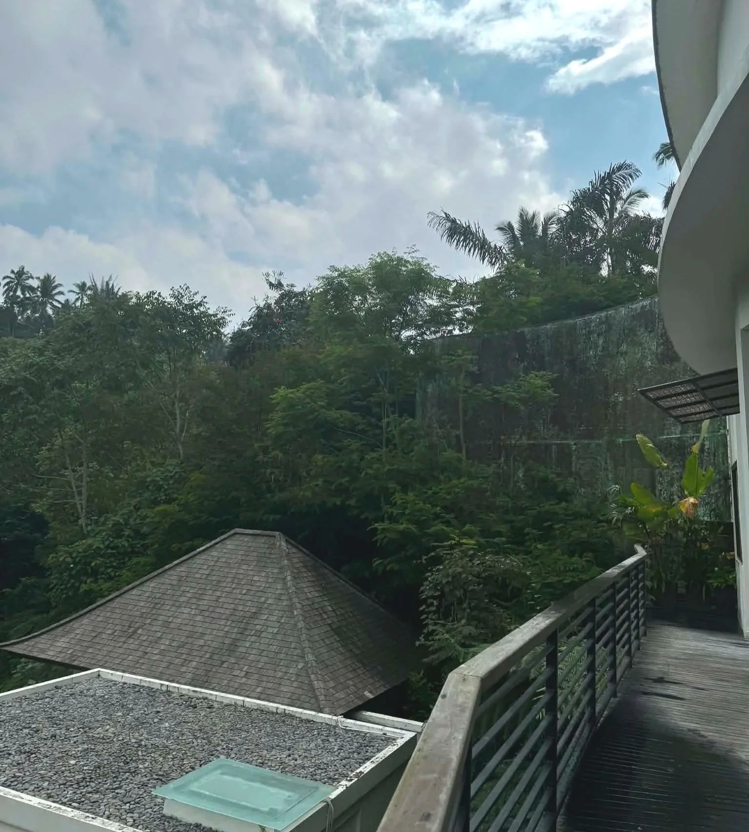 view of waterfall from cicada hotel ubud