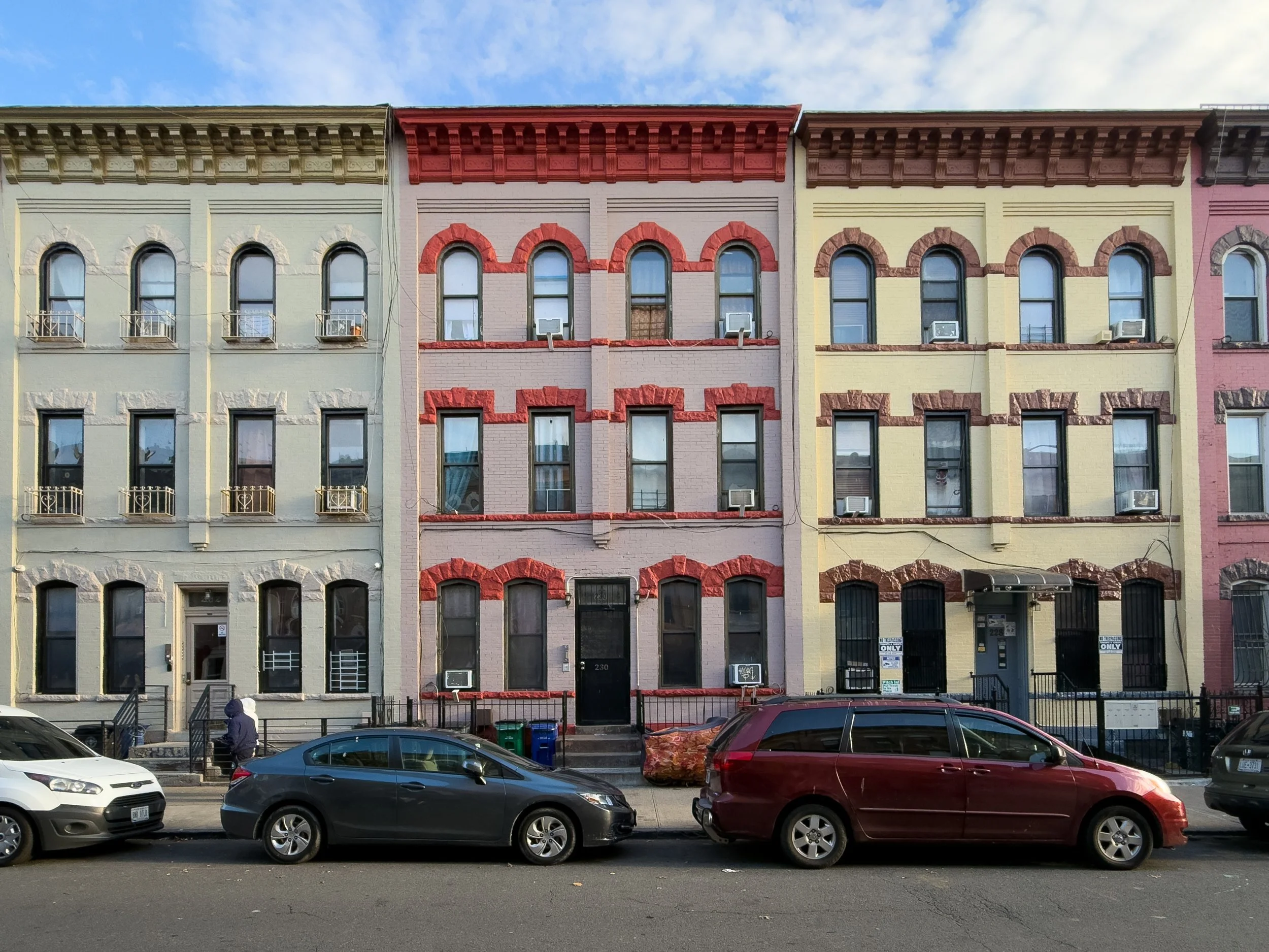 Residential streetscape with mid-rise buildings in Bushwick, Brooklyn, NYC, reflecting the neighborhood’s dense urban fabric and evolving real estate character.