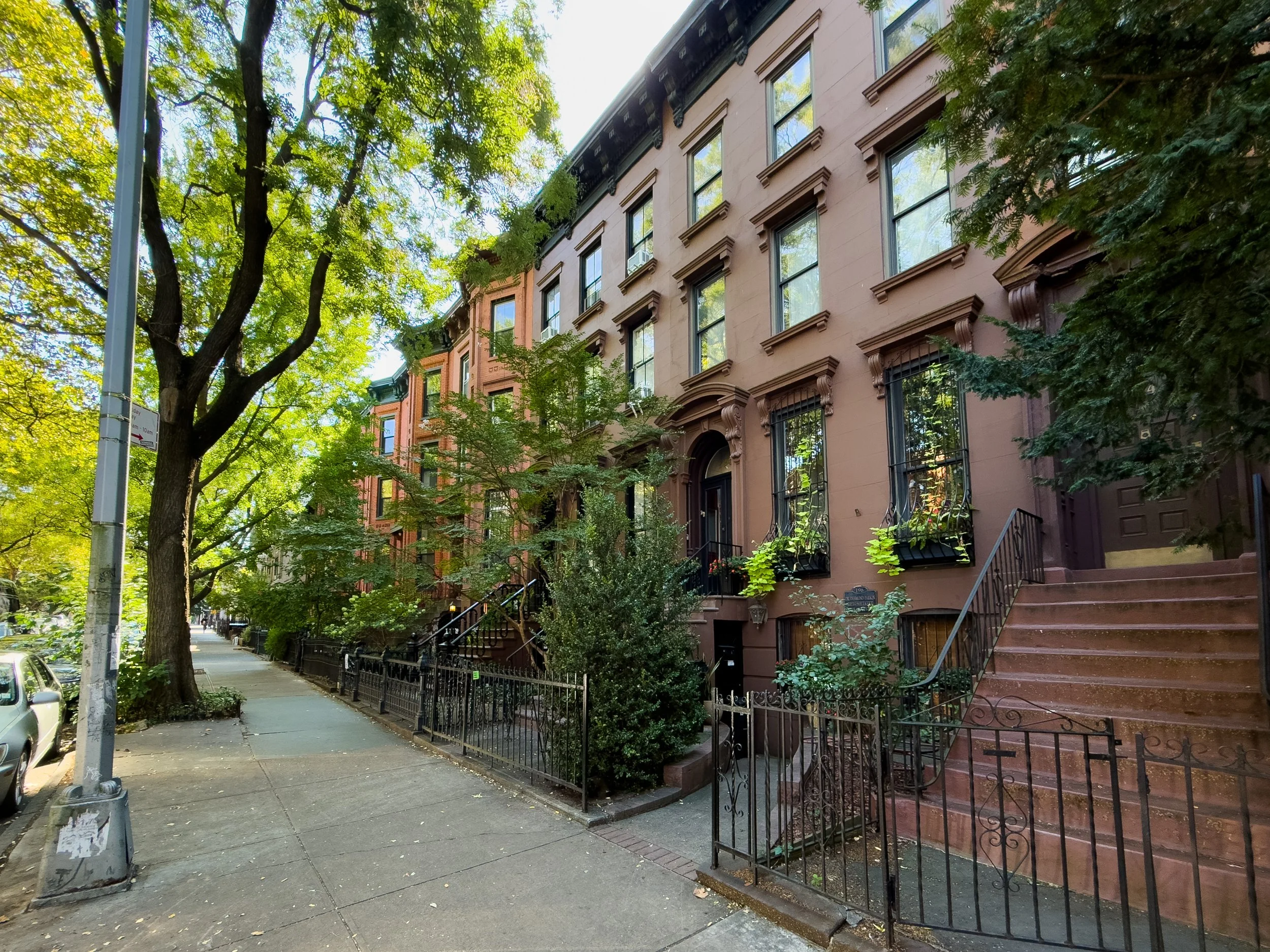 Tree-lined brownstone street in Prospect Heights, Brooklyn, NYC, highlighting the neighborhood’s historic residential character.
