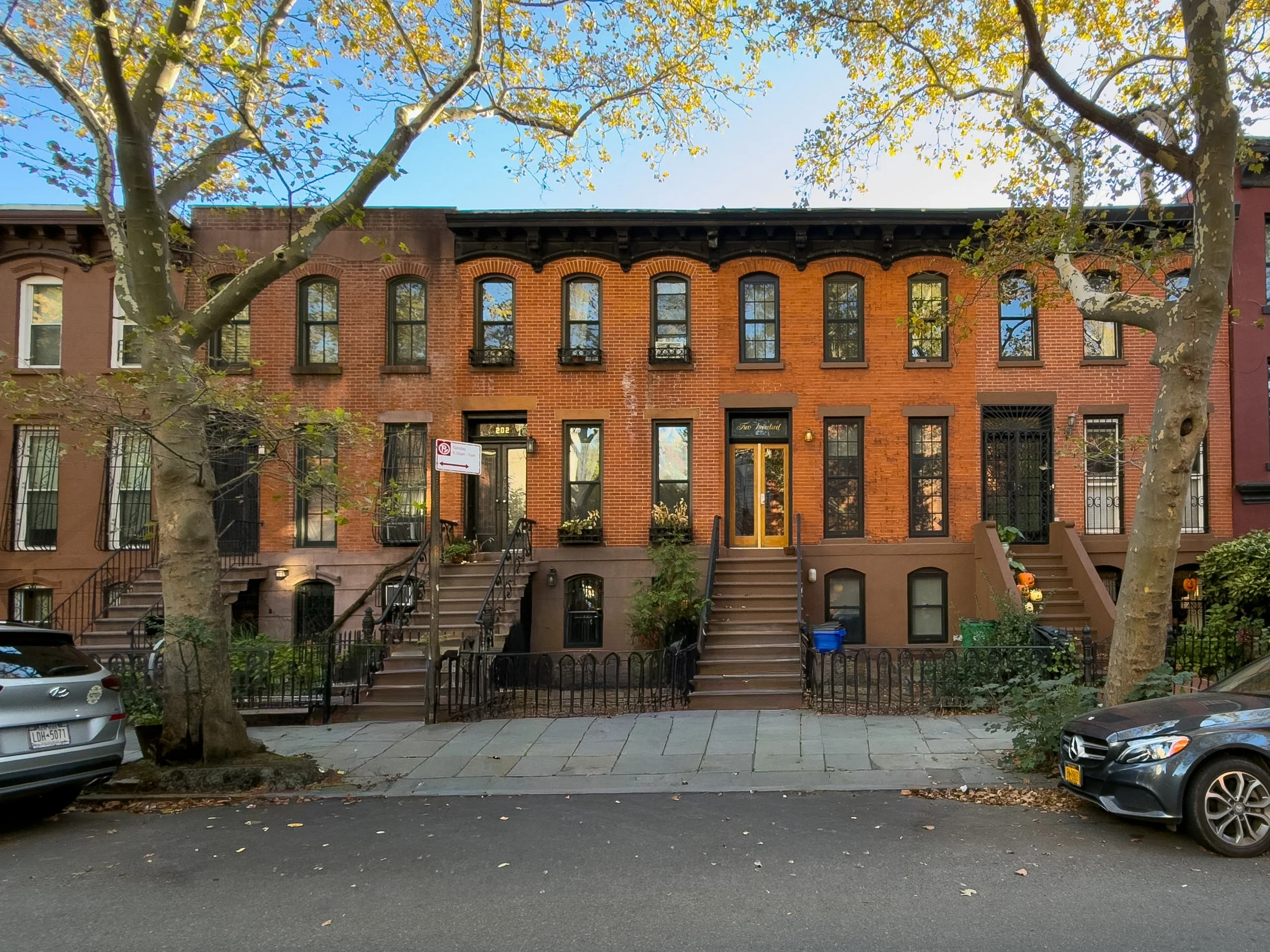 Tree-lined residential street with historic townhouses in Boerum Hill, Brooklyn, illustrating the neighborhood’s real estate character.