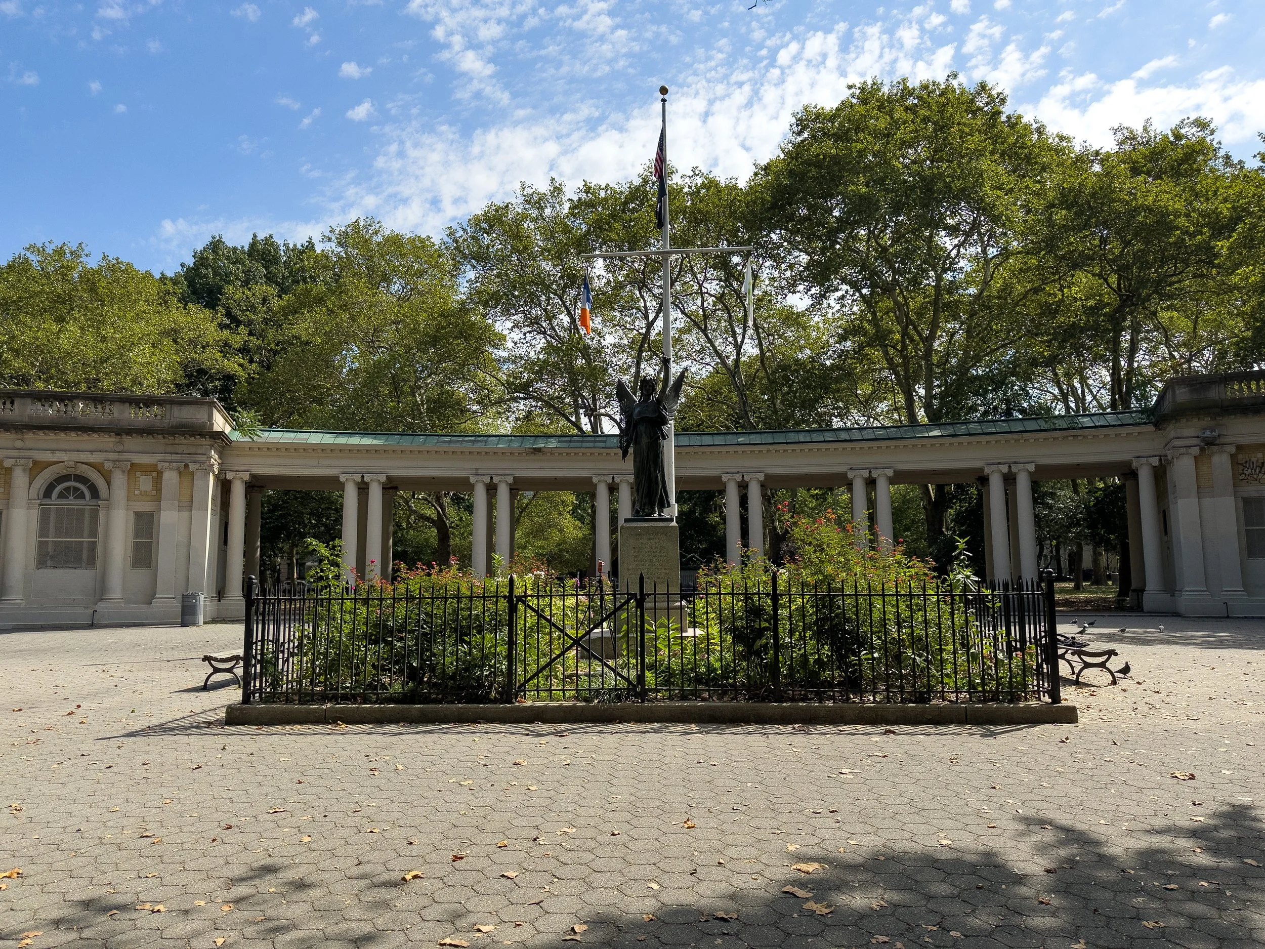 Msgr. McGolrick Park pavilion and tree-lined lawns in Greenpoint Brooklyn