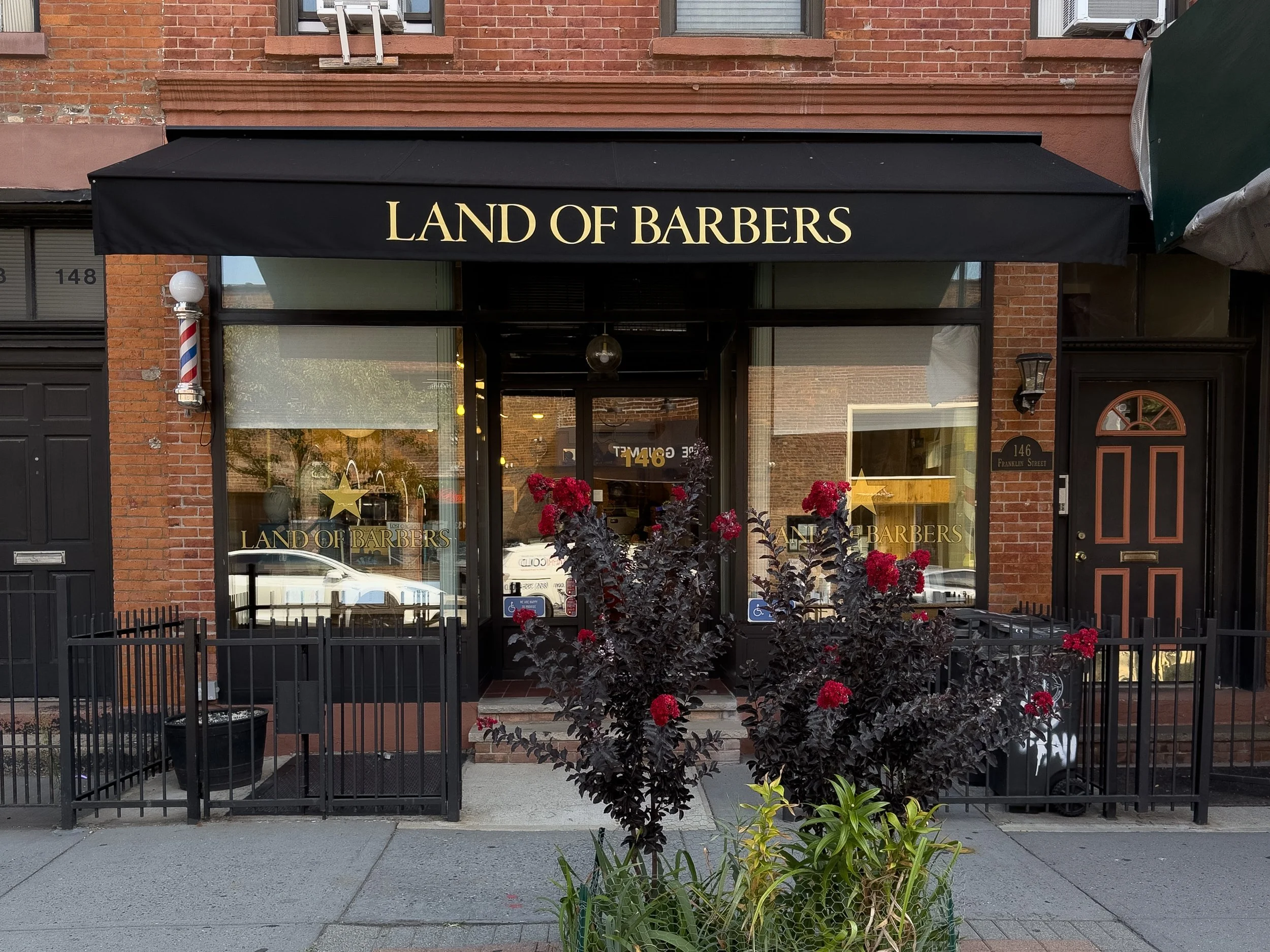 Land of Barbers shop on Manhattan Avenue in Greenpoint Brooklyn
