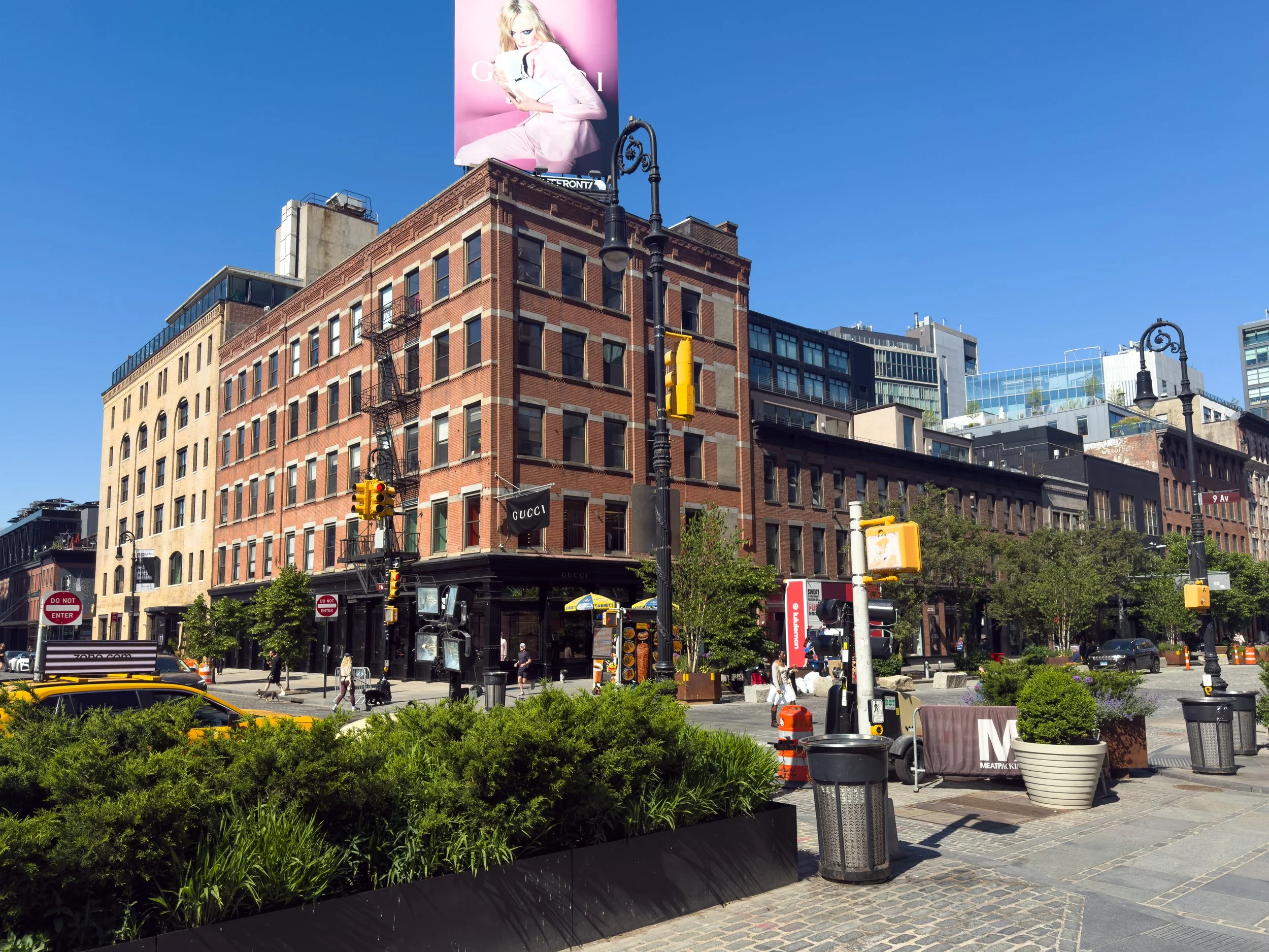9th Avenue and 14th Street streetscape in Chelsea, Manhattan, NYC, highlighting the neighborhood’s mix of historic architecture and contemporary real estate development.