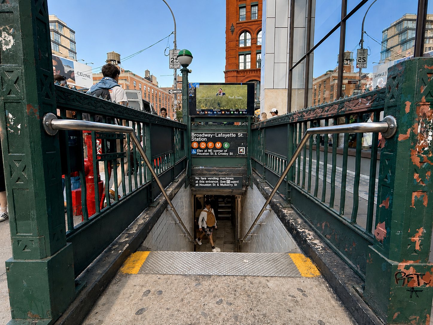 Broadway–Lafayette Street subway station serving Nolita, Manhattan, providing access to the B, D, F, and M subway lines.