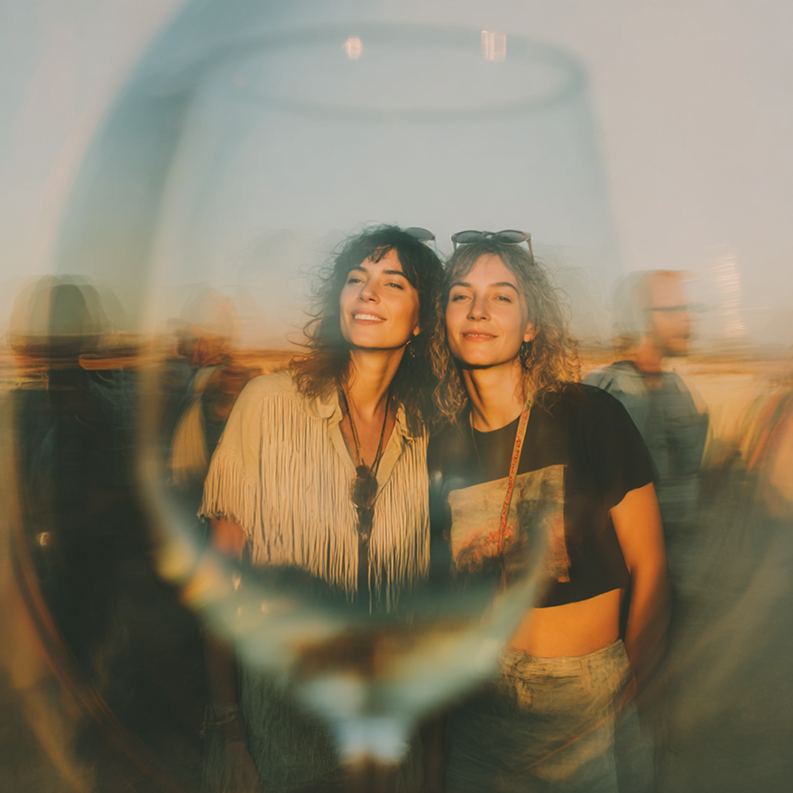 u5776259362_View_slightly_below_and_through_a_wine_glass_in_t_fa23cb17-da1b-468b-b10a-aa77a2ce81cf_1 1.png