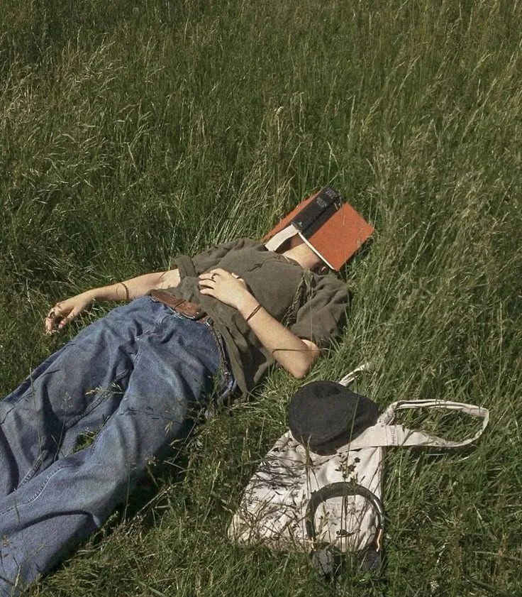 Girl laying in grass