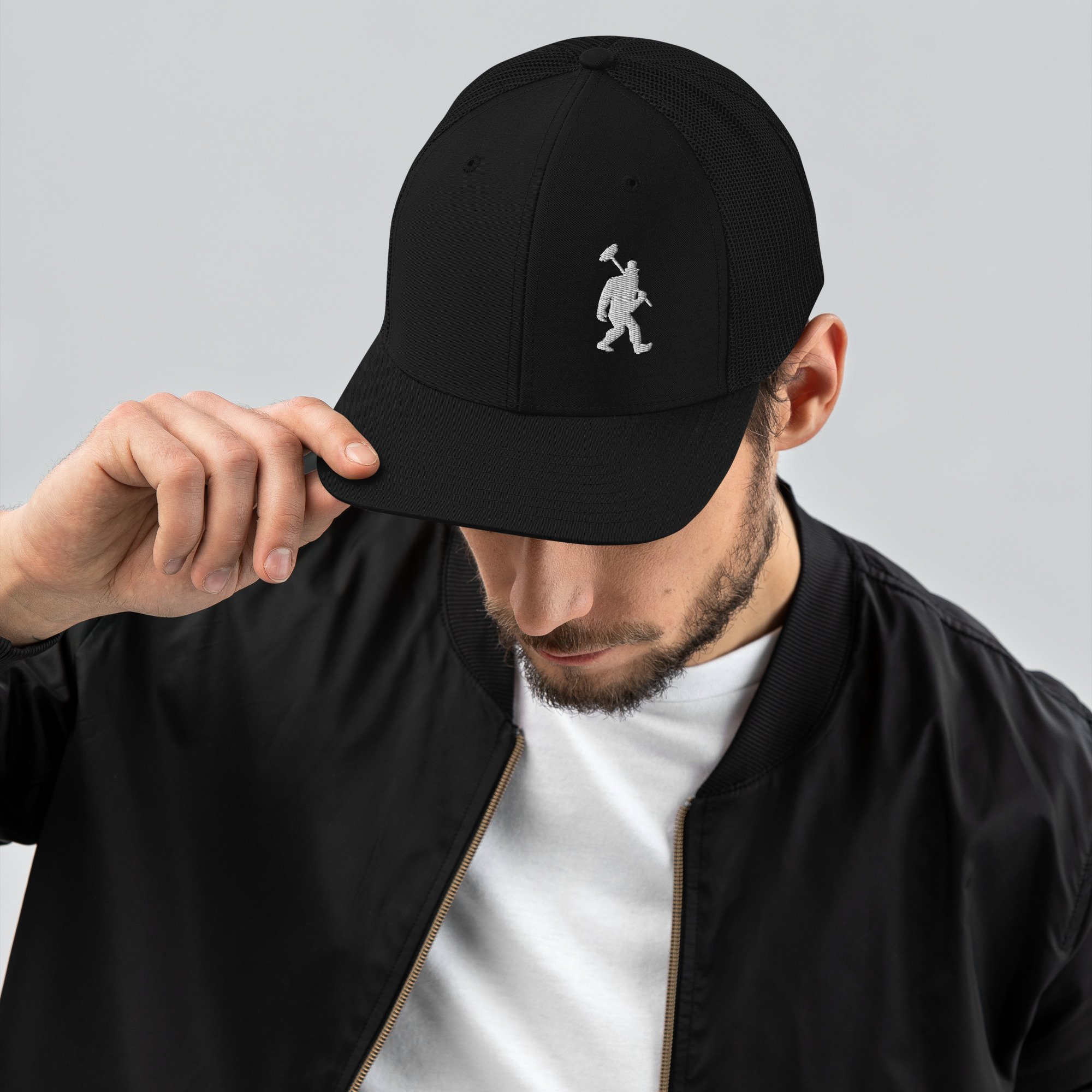 snapback-trucker-cap-black-front-66d8dc602c579.jpg