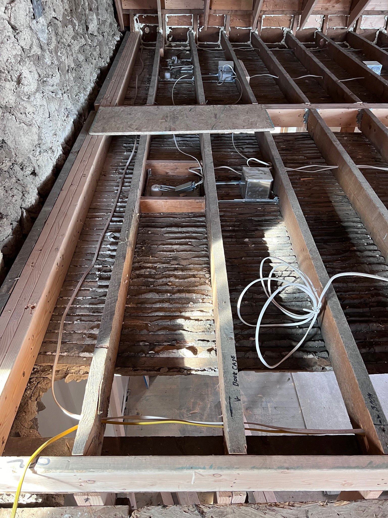 Attic rafters exposed.jpeg