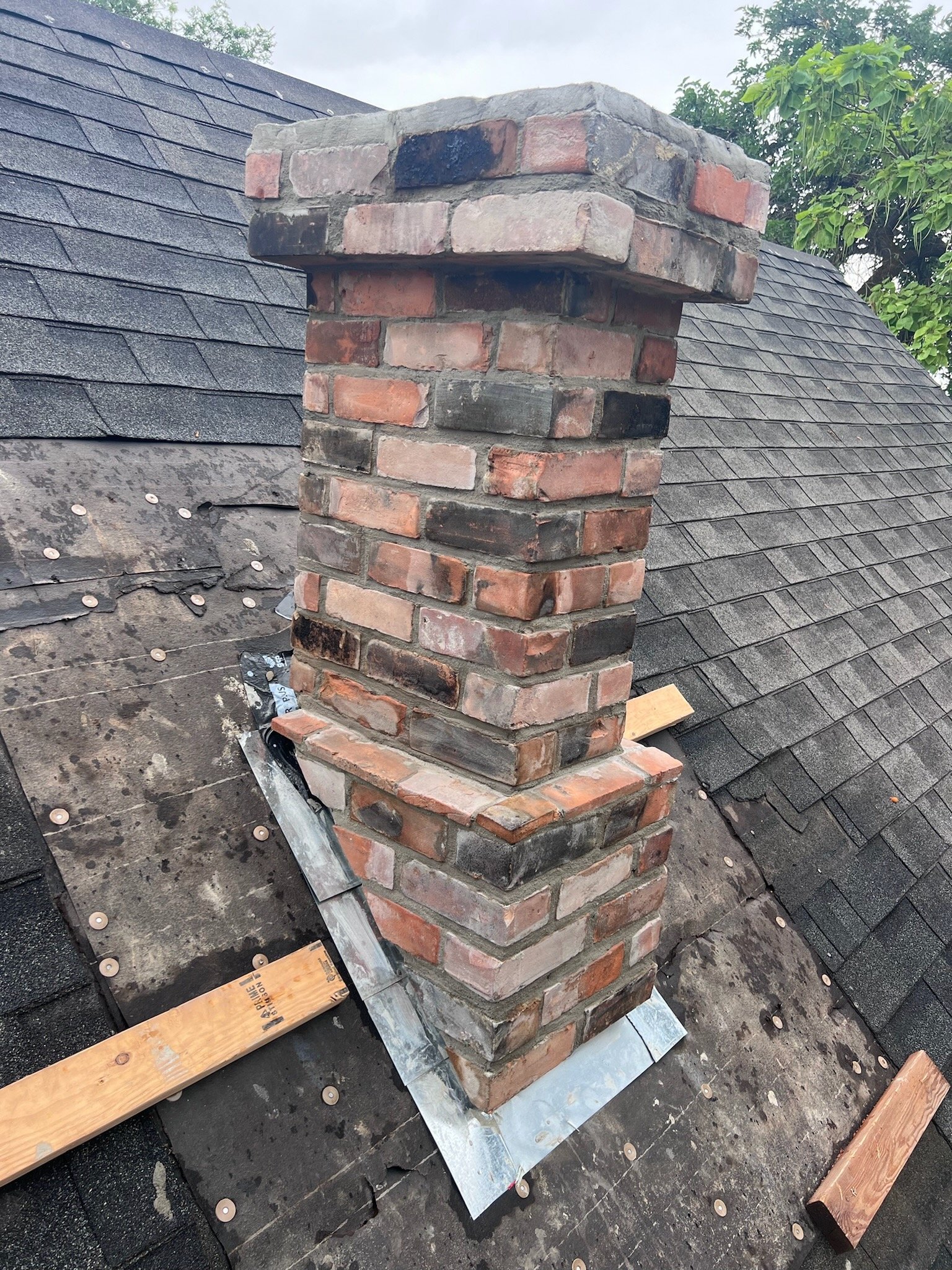 Chimney brick re-install