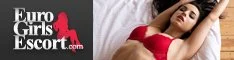 A woman lying down wearing a red dress with the logo 'Euro Girls Escort' in the bottom left corner.