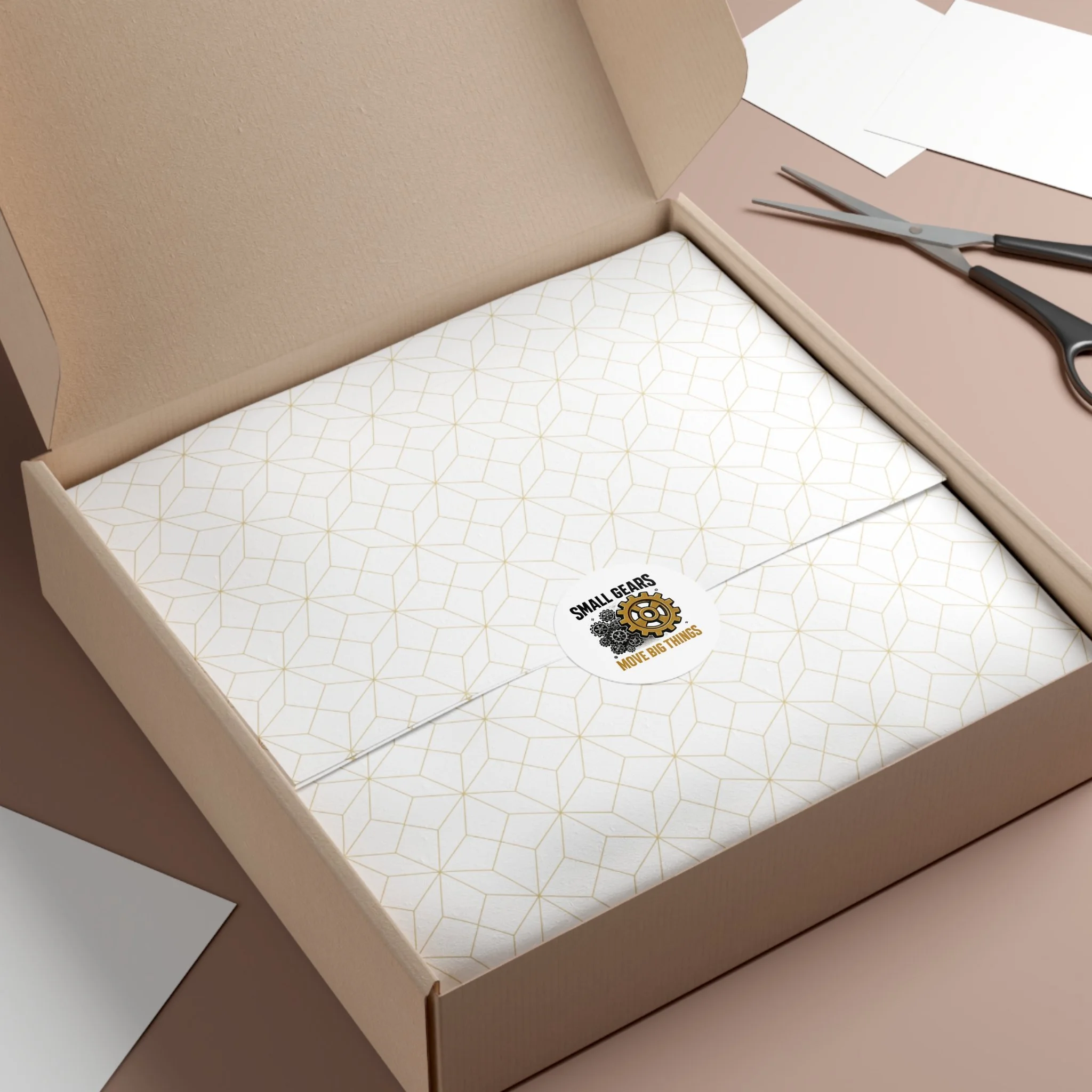 Round matte vinyl sticker with black gear cluster and one bronze gear reading “SMALL GEARS — MOVE BIG THINGS.