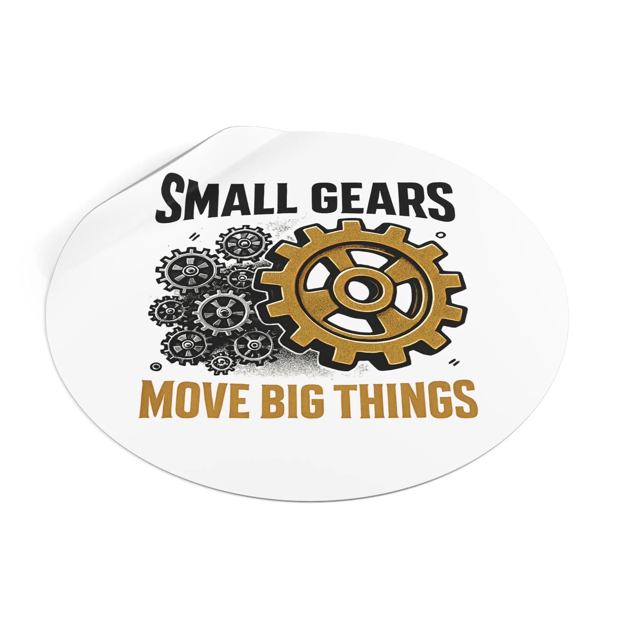 Round matte vinyl sticker with black gear cluster and one bronze gear reading “SMALL GEARS — MOVE BIG THINGS.