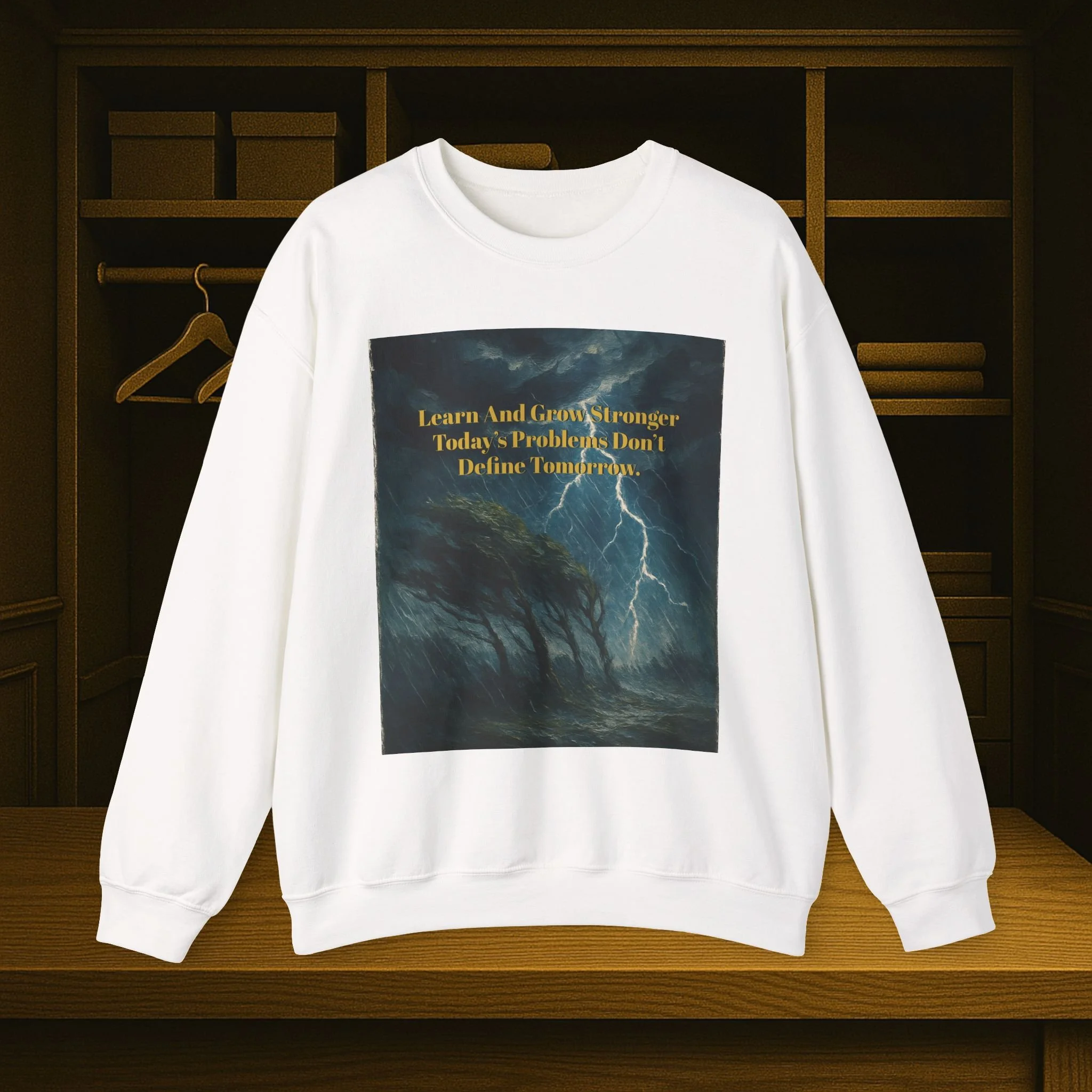 Unisex crewneck sweatshirt reading “Learn and Grow Stronger—Today’s Problems Don’t Define Tomorrow.”