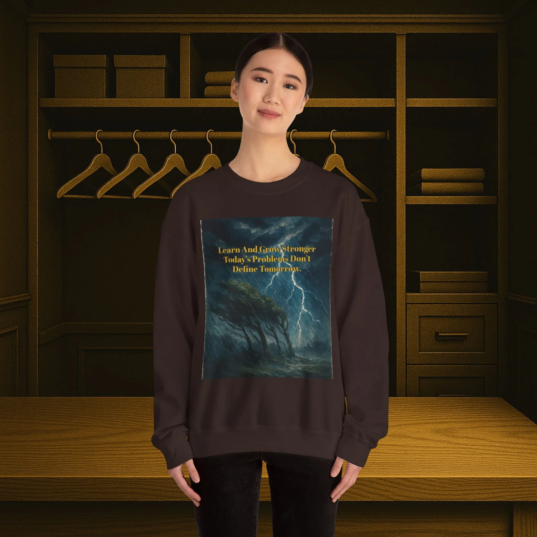 Unisex crewneck sweatshirt reading “Learn and Grow Stronger—Today’s Problems Don’t Define Tomorrow.”
