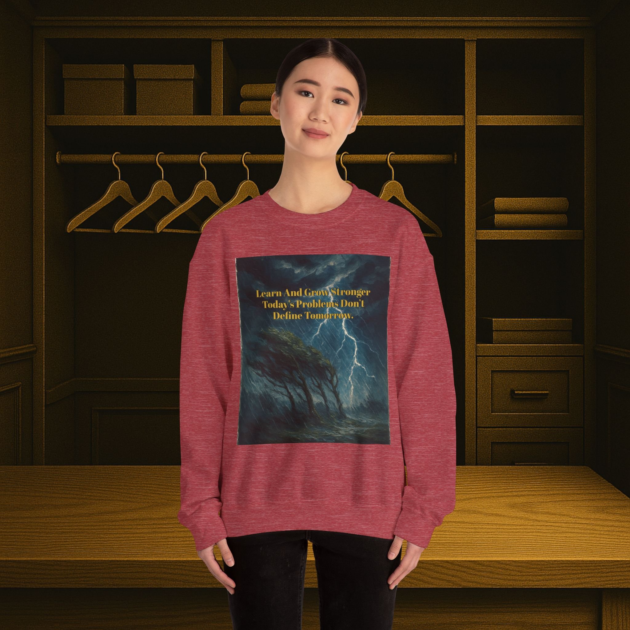 Unisex crewneck sweatshirt reading “Learn and Grow Stronger—Today’s Problems Don’t Define Tomorrow.”