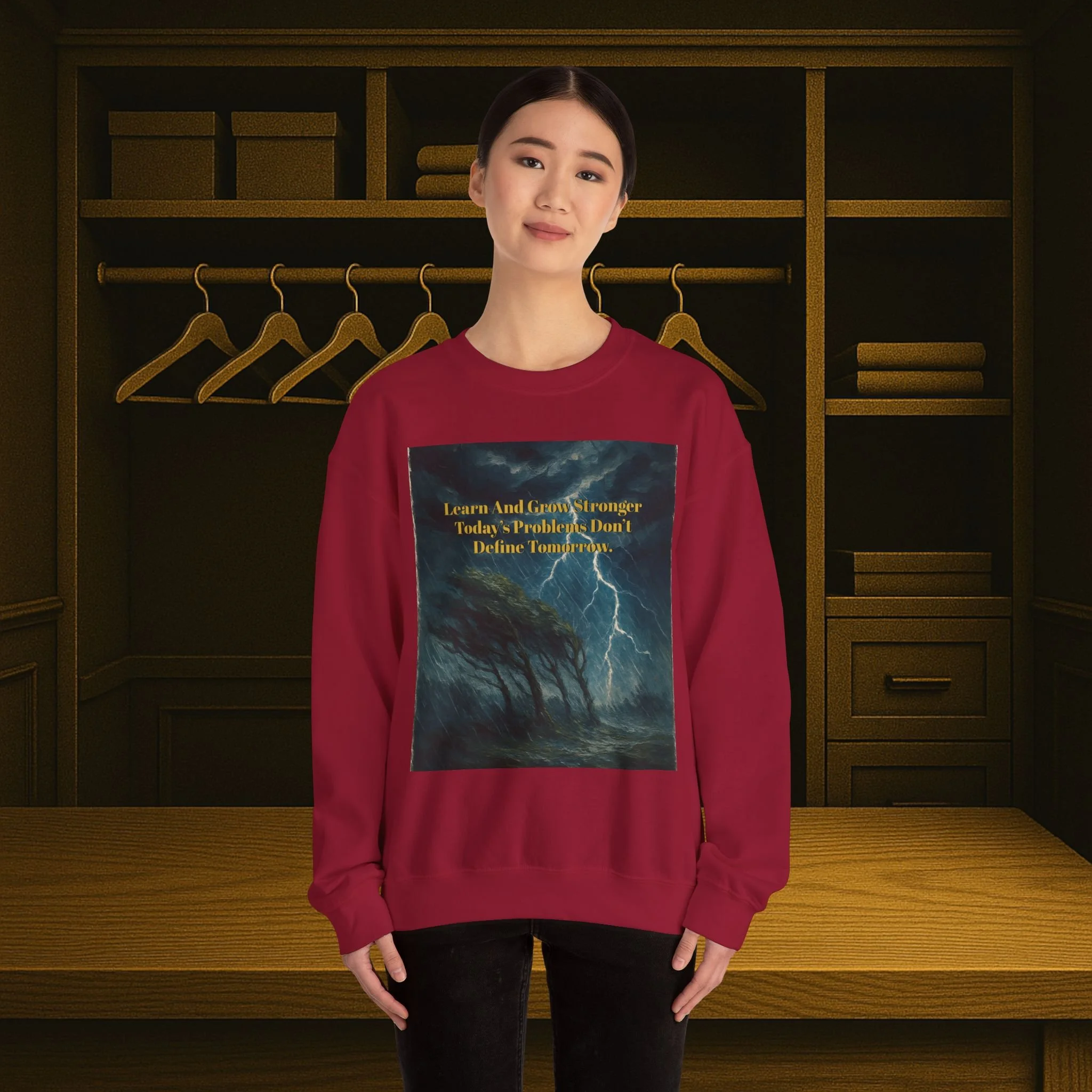Unisex crewneck sweatshirt reading “Learn and Grow Stronger—Today’s Problems Don’t Define Tomorrow.”