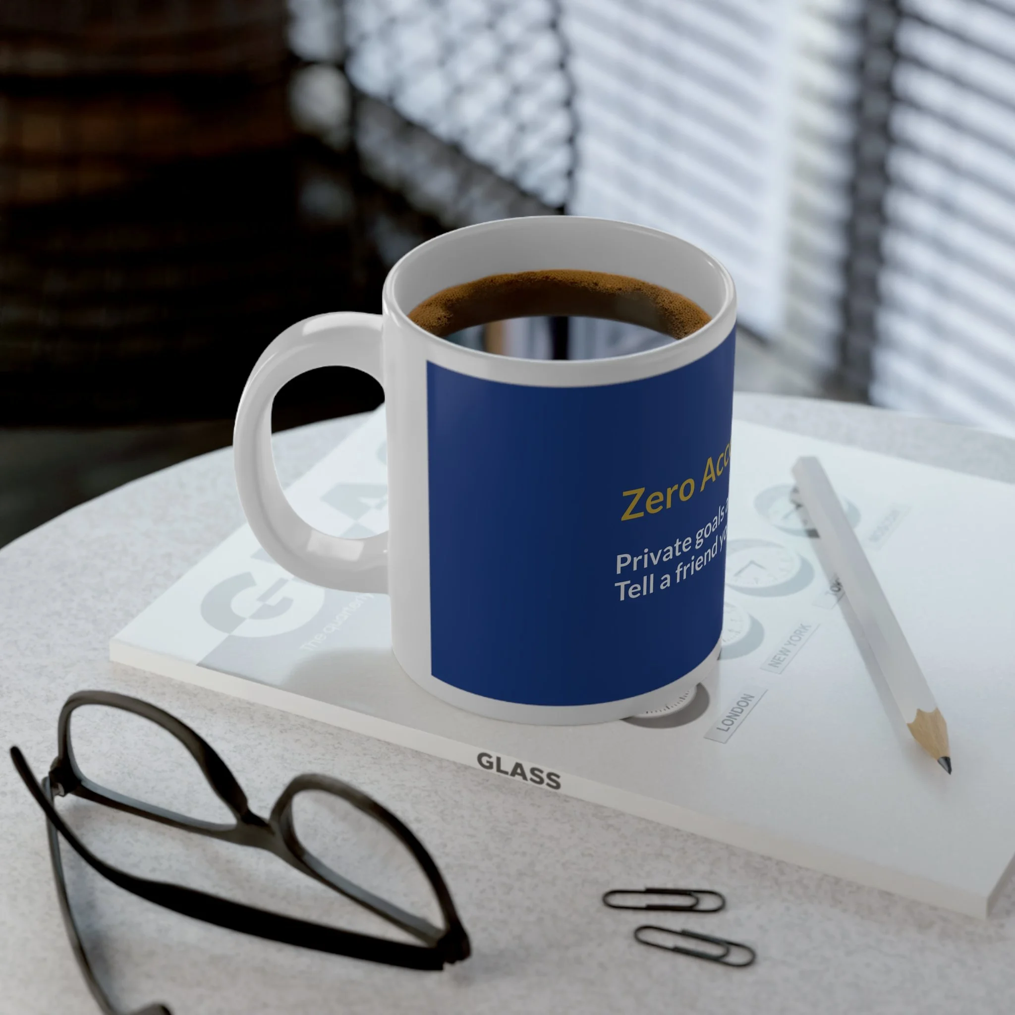 20 oz white ceramic mug with glossy finish and C-shaped handle featuring “Zero Accountability—Tell a Friend Your Weekly Target.”