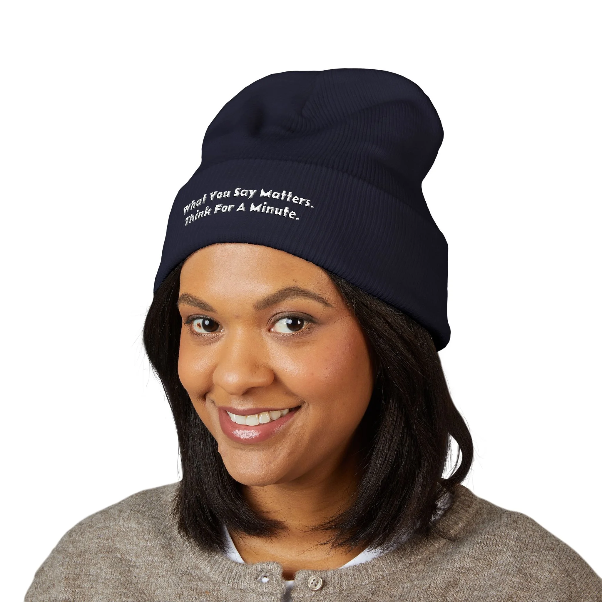 Lifestyle front view of person wearing embroidered beanie.