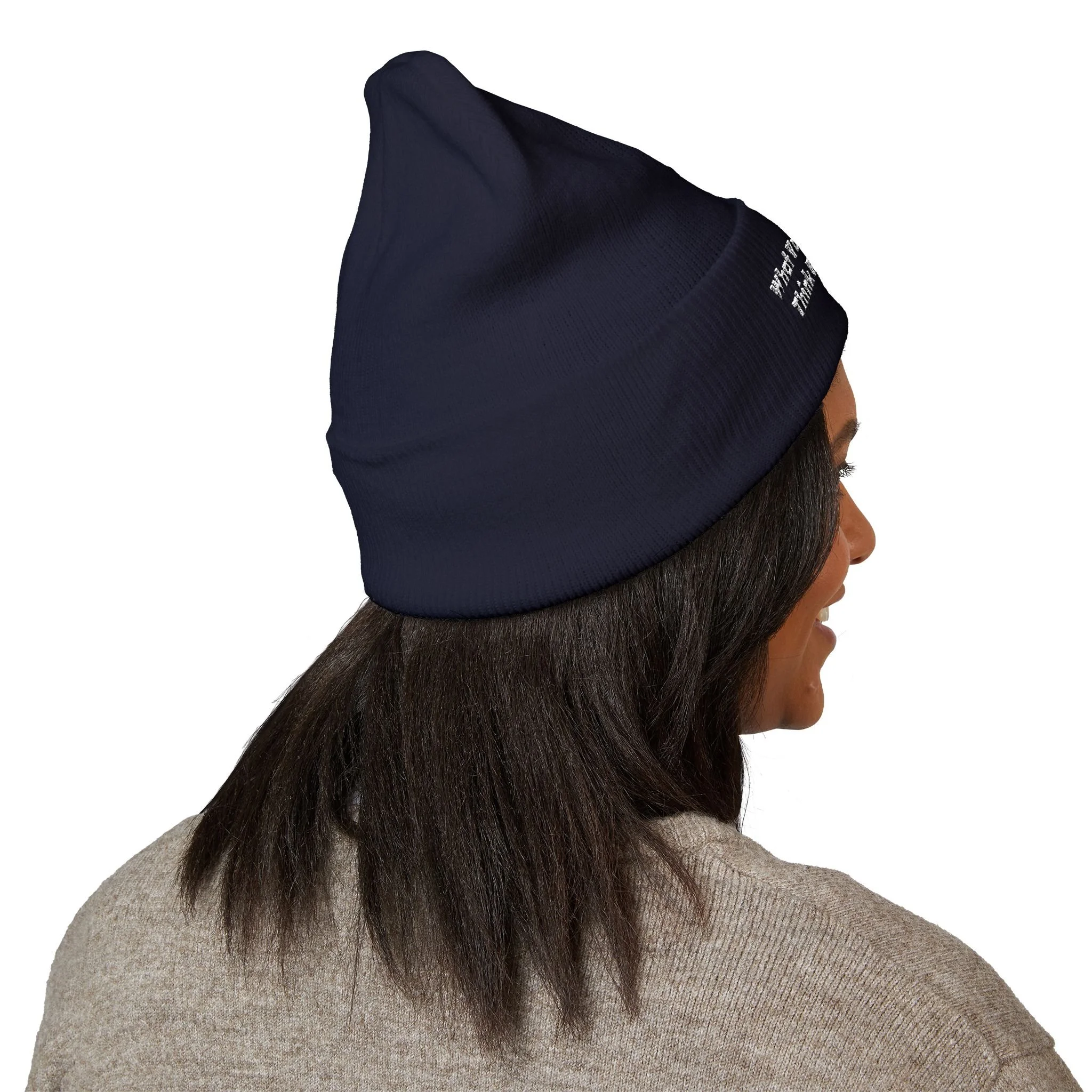 Lifestyle side view of person wearing cuffed beanie.