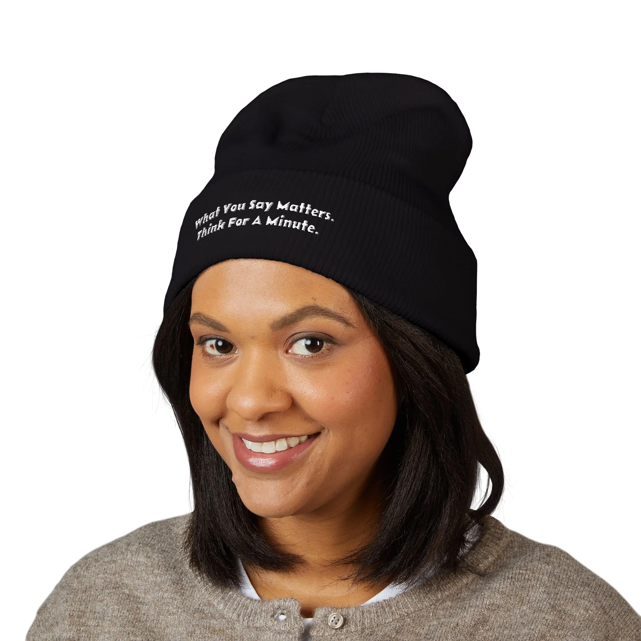 Lifestyle front view of person wearing embroidered beanie.