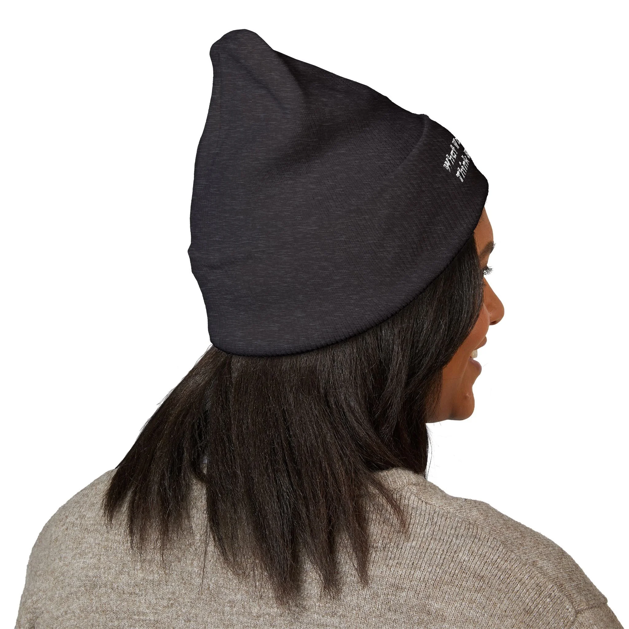 Lifestyle side view of person wearing cuffed beanie.