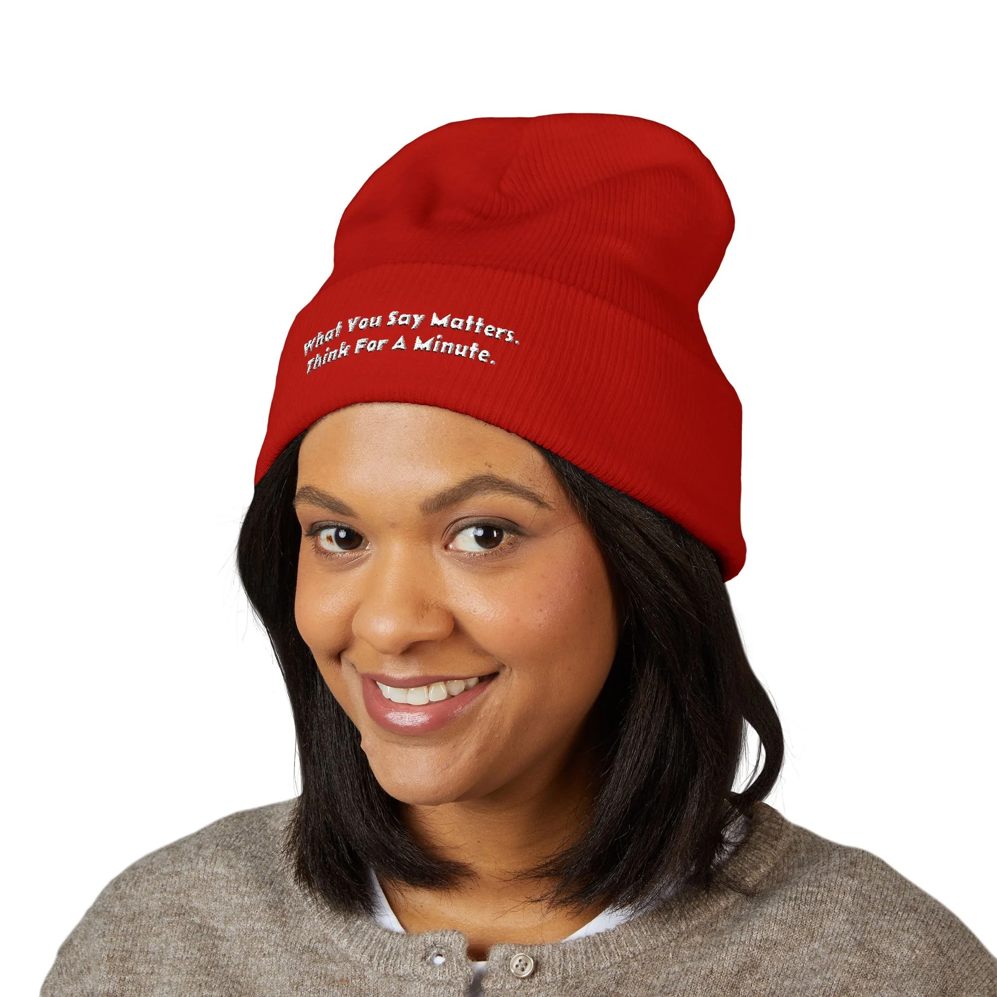 Lifestyle front view of person wearing embroidered beanie.