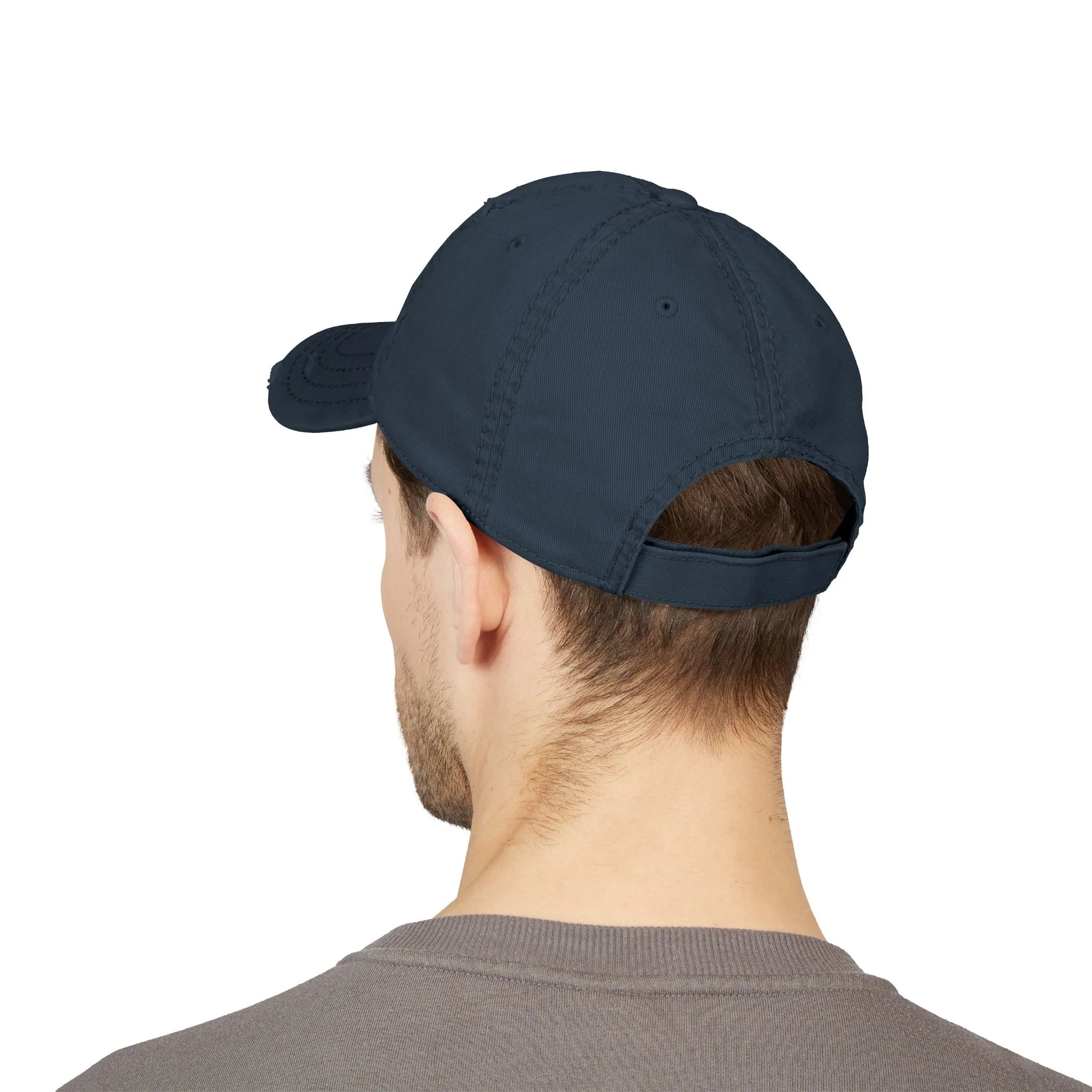 Lifestyle back view of distressed dad hat.